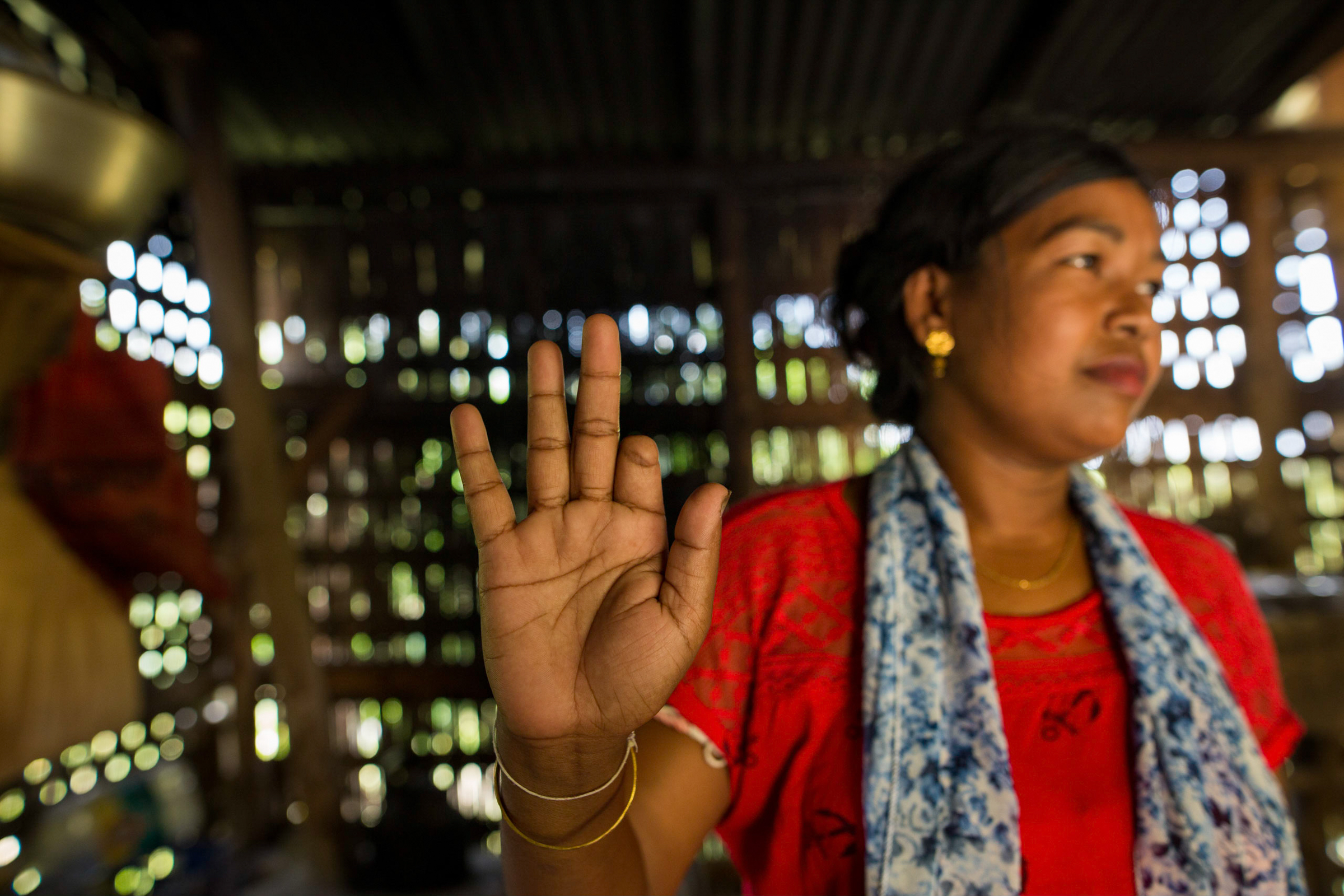 Photo of woman with part of finger missing in Rangamati town, Bangladesh's landslide prone area