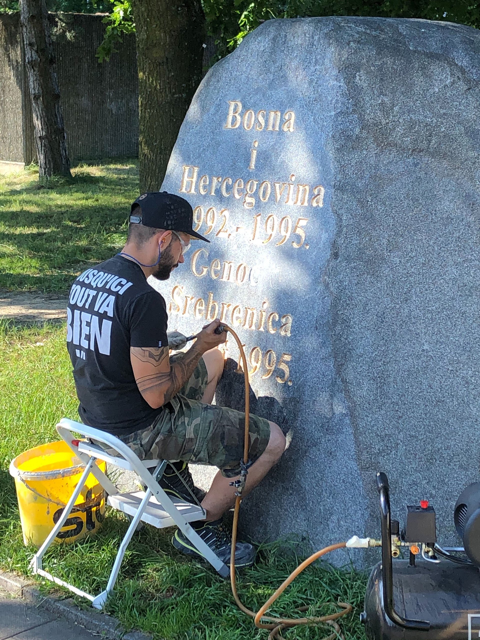 A stonemason added the word 'genocide' to a monument