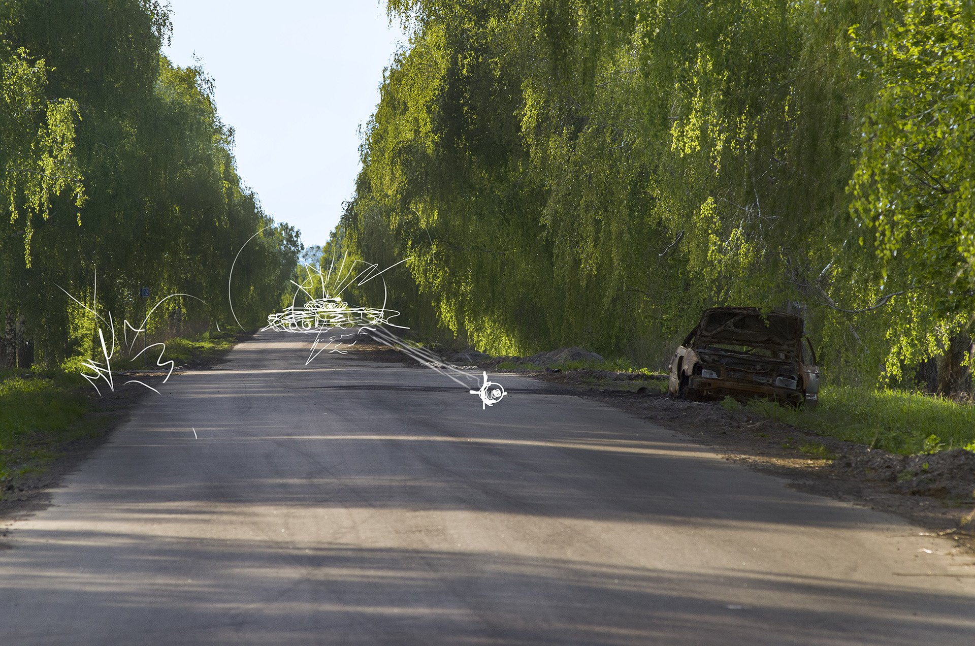 A photograph of a tree lined road with a damaged car on the side and illustrations on top