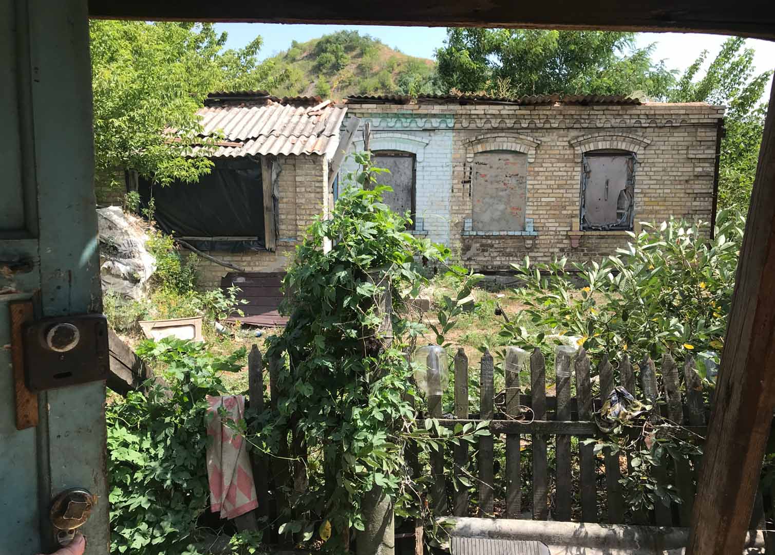 Lidiia, an 85-year-old woman, lived alone in this home close to the front lines in the eastern Ukrainian city of Mariinka. Lidiia was found dead in the rubble of the house in March 2022.