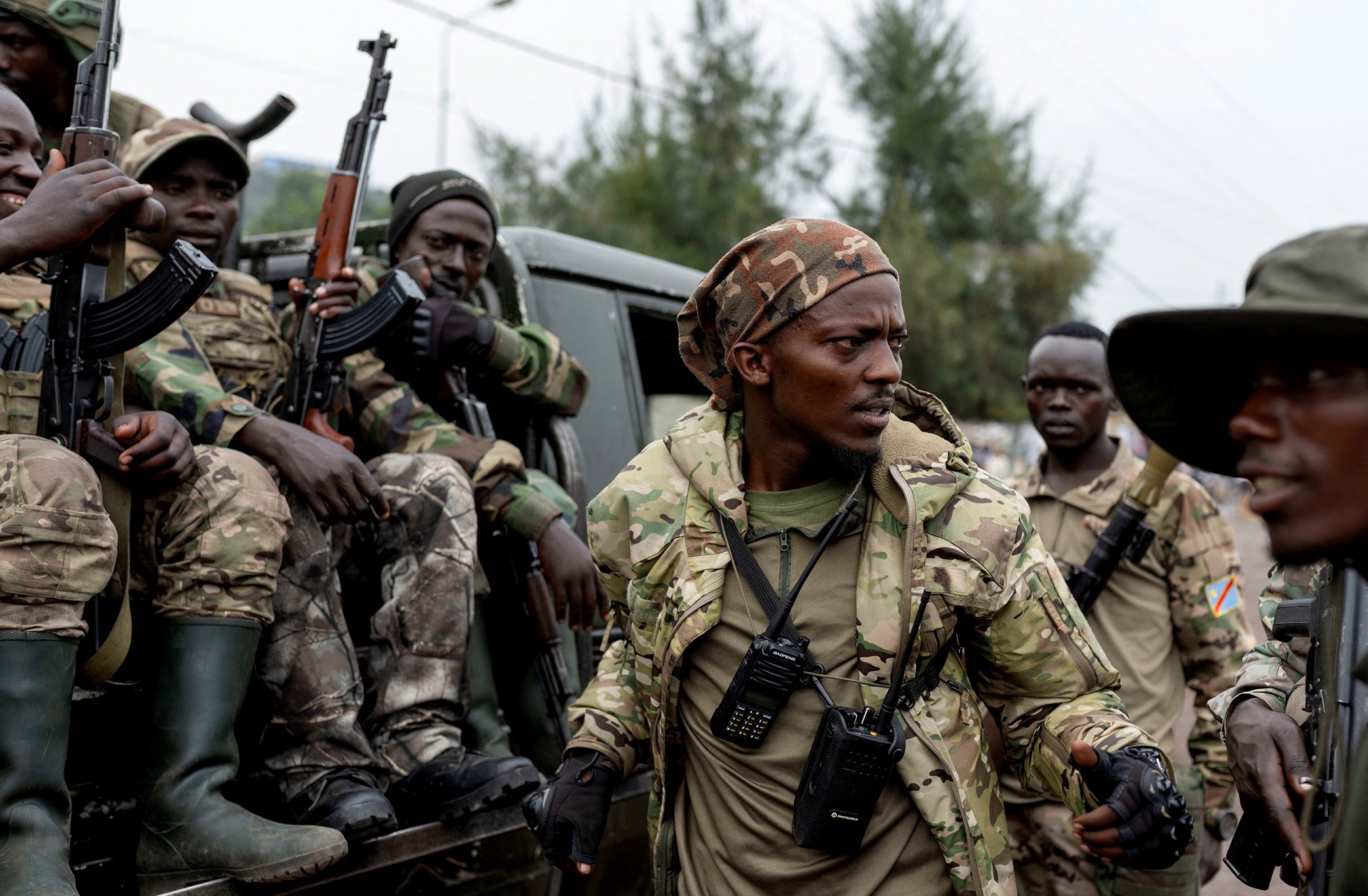 Members of the M23 rebel group on a pick-up truck in Goma, shortly after they seized the city in late January.