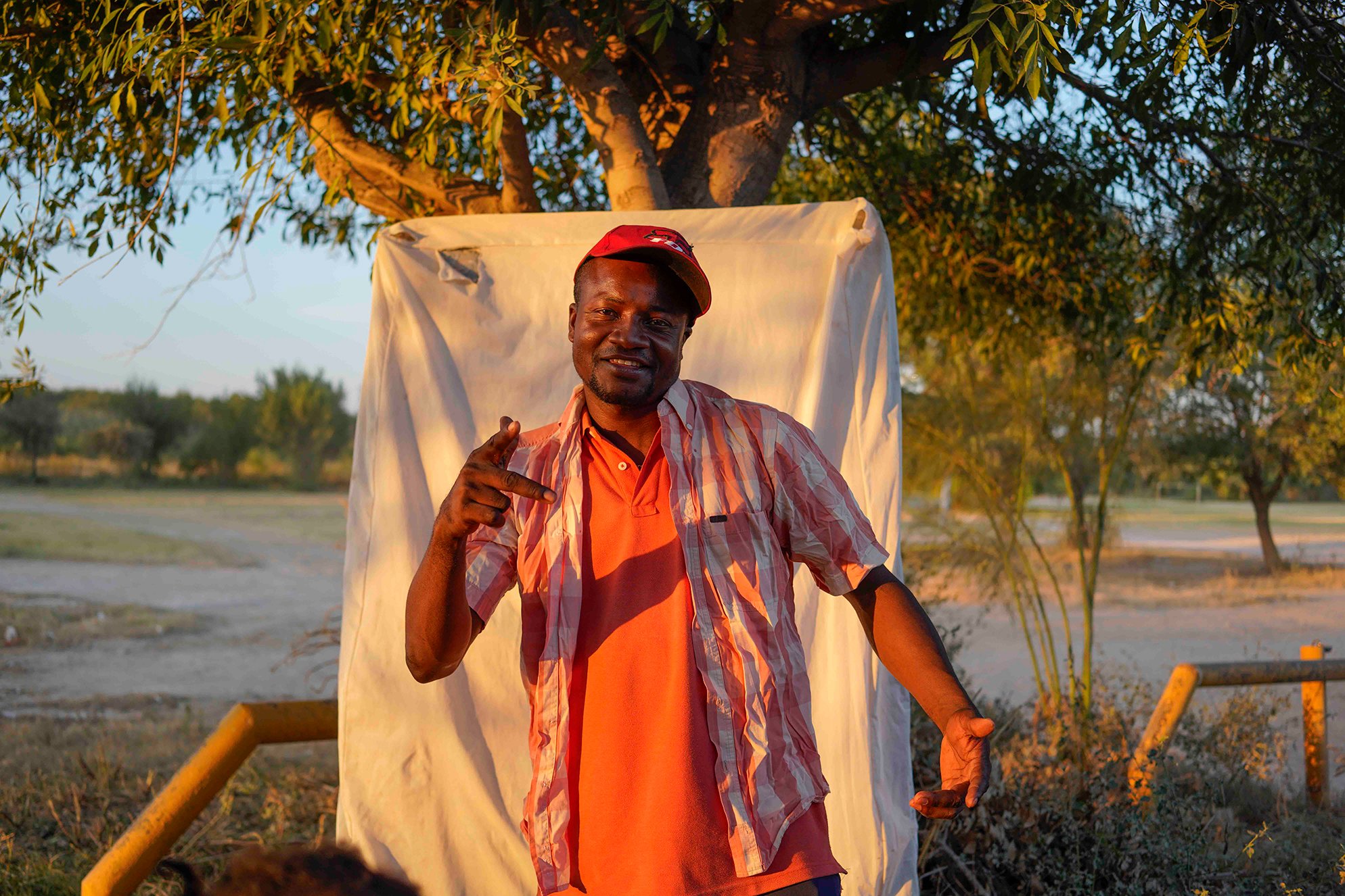 Jean Alix Plaisir poses for a picture at the makshift camp in Ciudad Acuña, Mexico, on September 20th, 2021.