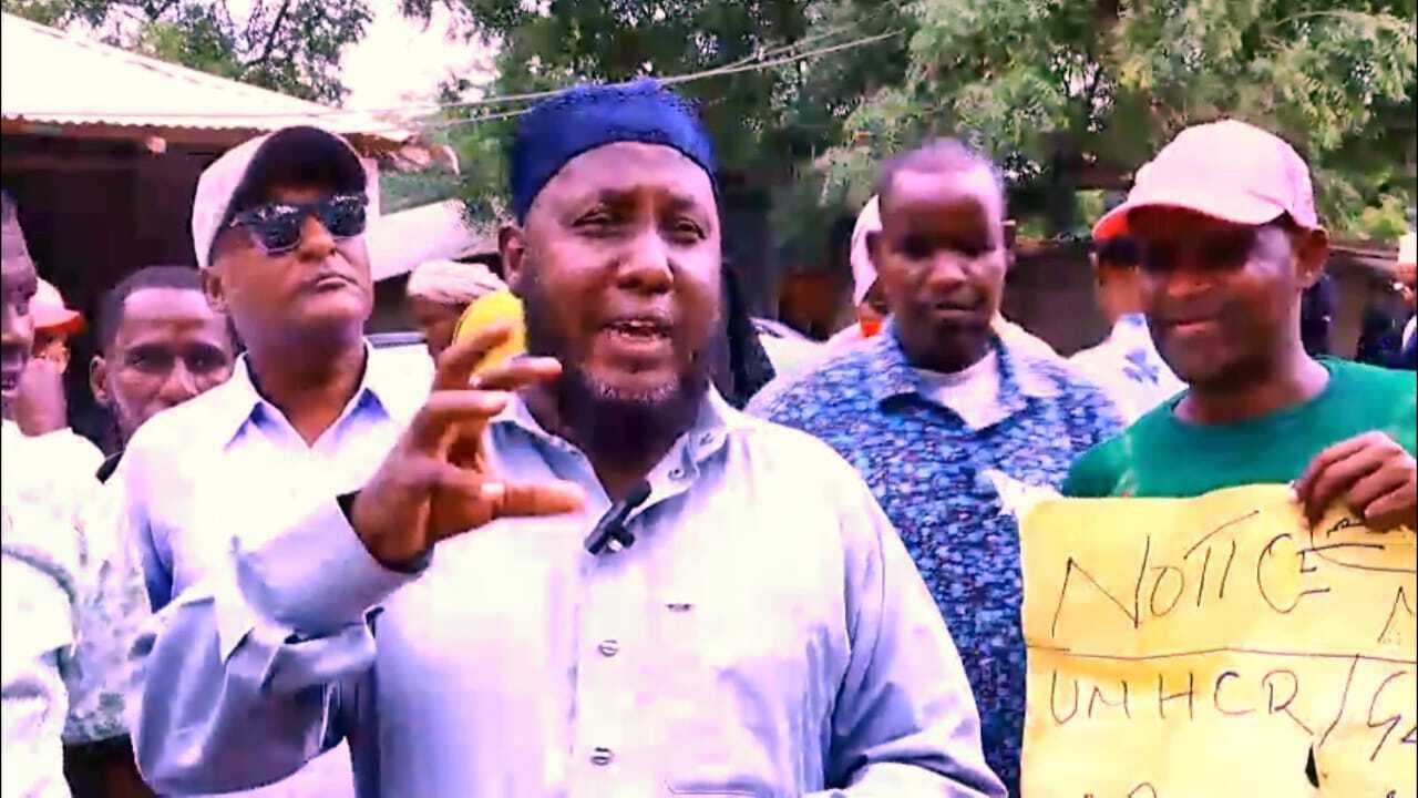 A photo of local Kenyan protestors in Dadaab demonstrate outside the UN compound over the termination of locally-hired workers.
