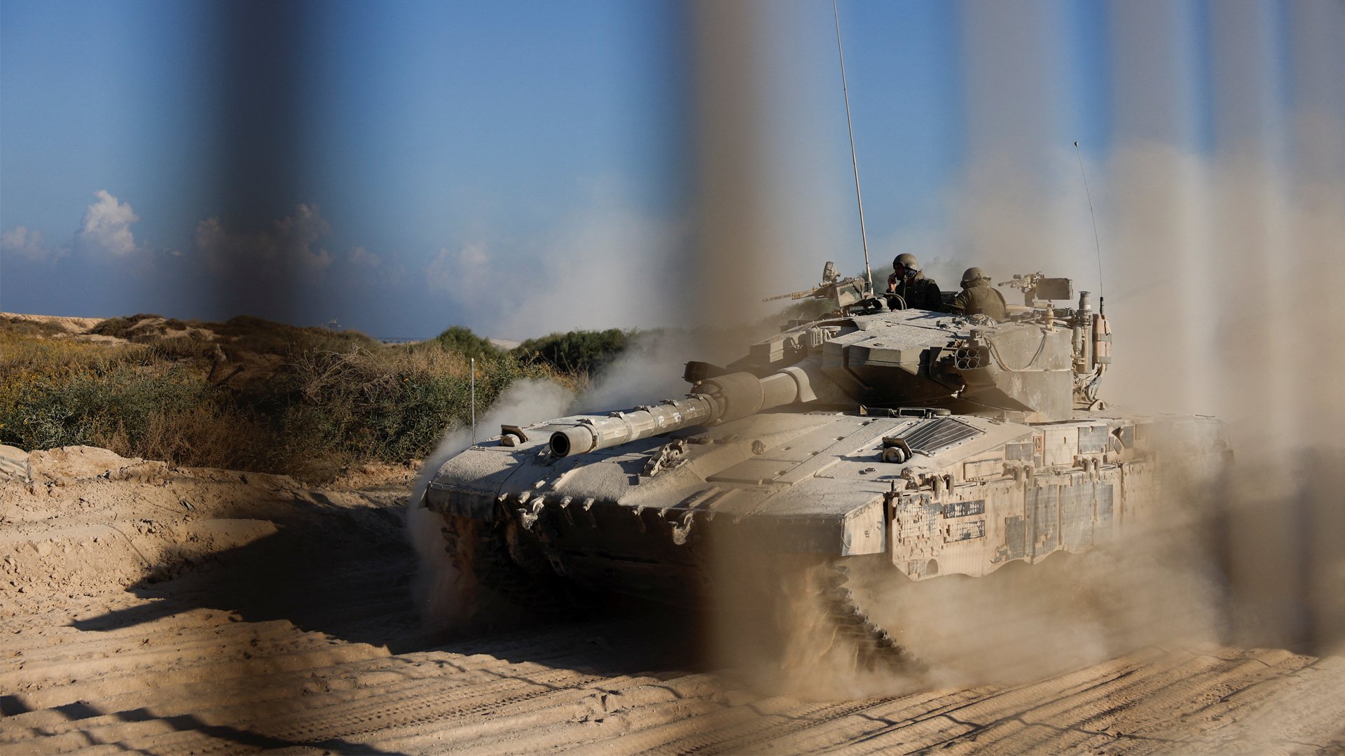 An Israeli tank manoeuvres before entering into the Gaza Strip, amid the ongoing conflict in Gaza between Israel and Hamas, at the Kerem Shalom crossing in southern Israel, November 11, 2024.