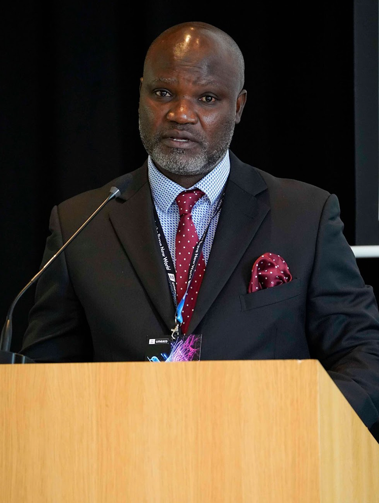 Portrait photo of Churchill Otieno, Board President of TNH