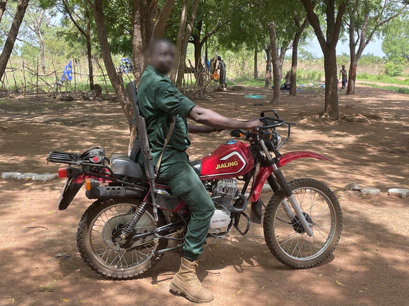 Armed eco-guard, Bouba Njdida National Park.