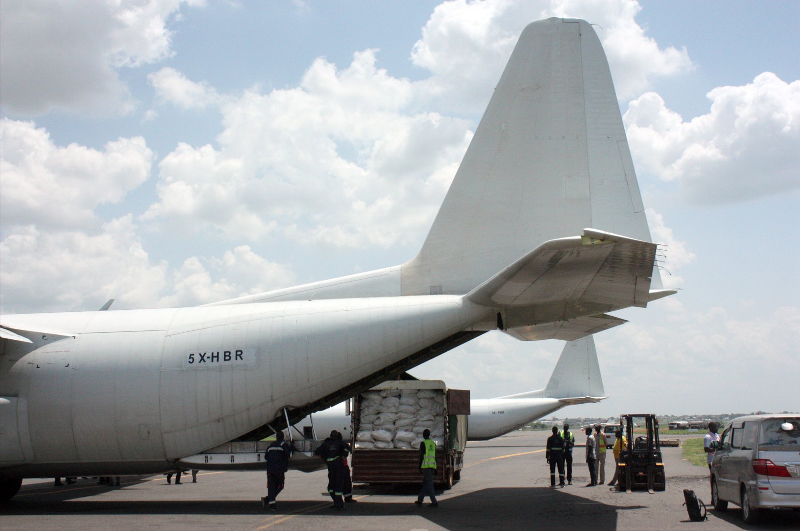 A BAR Aviation plane waiting to be loaded with sacks of food aid destined for the town of Nasir, on 9 June 2025, at Juba International Airport.