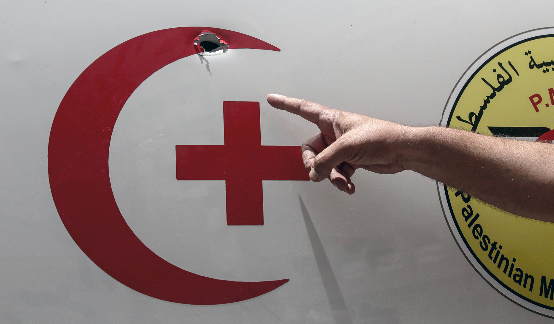 A Palestinian ambulance riddled with bullet holes after being shot by Israeli soldiers seen in the middle of a market. Israeli forces raided the central market and several gold and money exchange shops alleging they are dealing with Hamas. Nablus, Palestine, 27 May 2025.