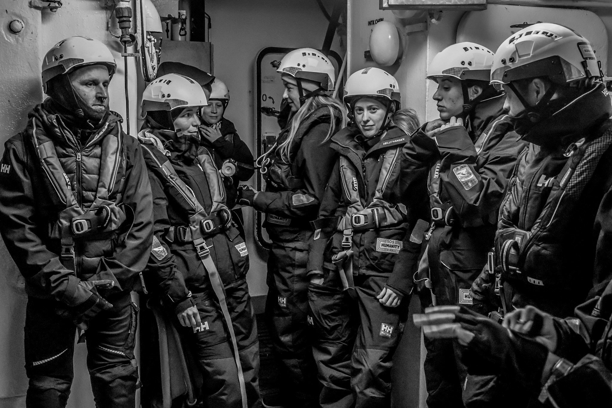 The crew of Humanity 1 prepares for a night rescue mission.