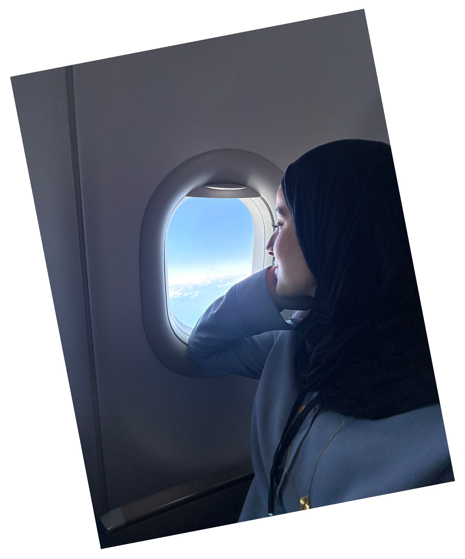  Nour on the airplane from Jordan to France, her first time flying and first time leaving Gaza.