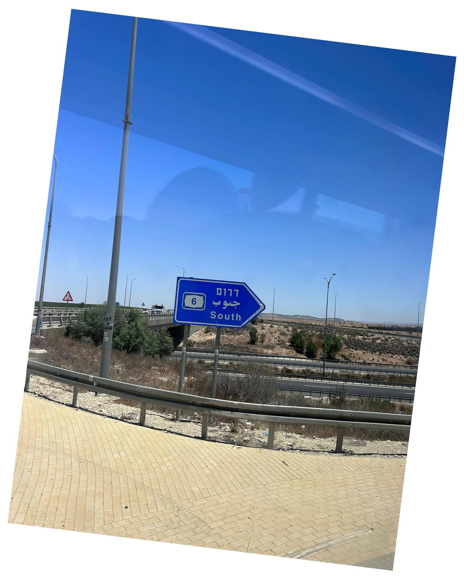 A photo of an Israeli road sign taken as Nour crossed a homeland she has never been able to visit as a Palestinian born in Gaza.