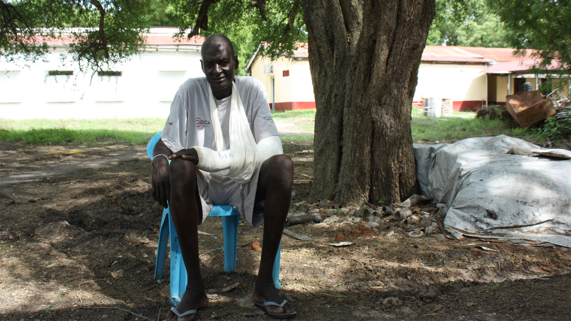 Both Nhial, a White Army fighter who was injured during the attack on a government garrison in Nasir in March, sits for a picture at a hospital in Jonglei state, on 22 May 2025.