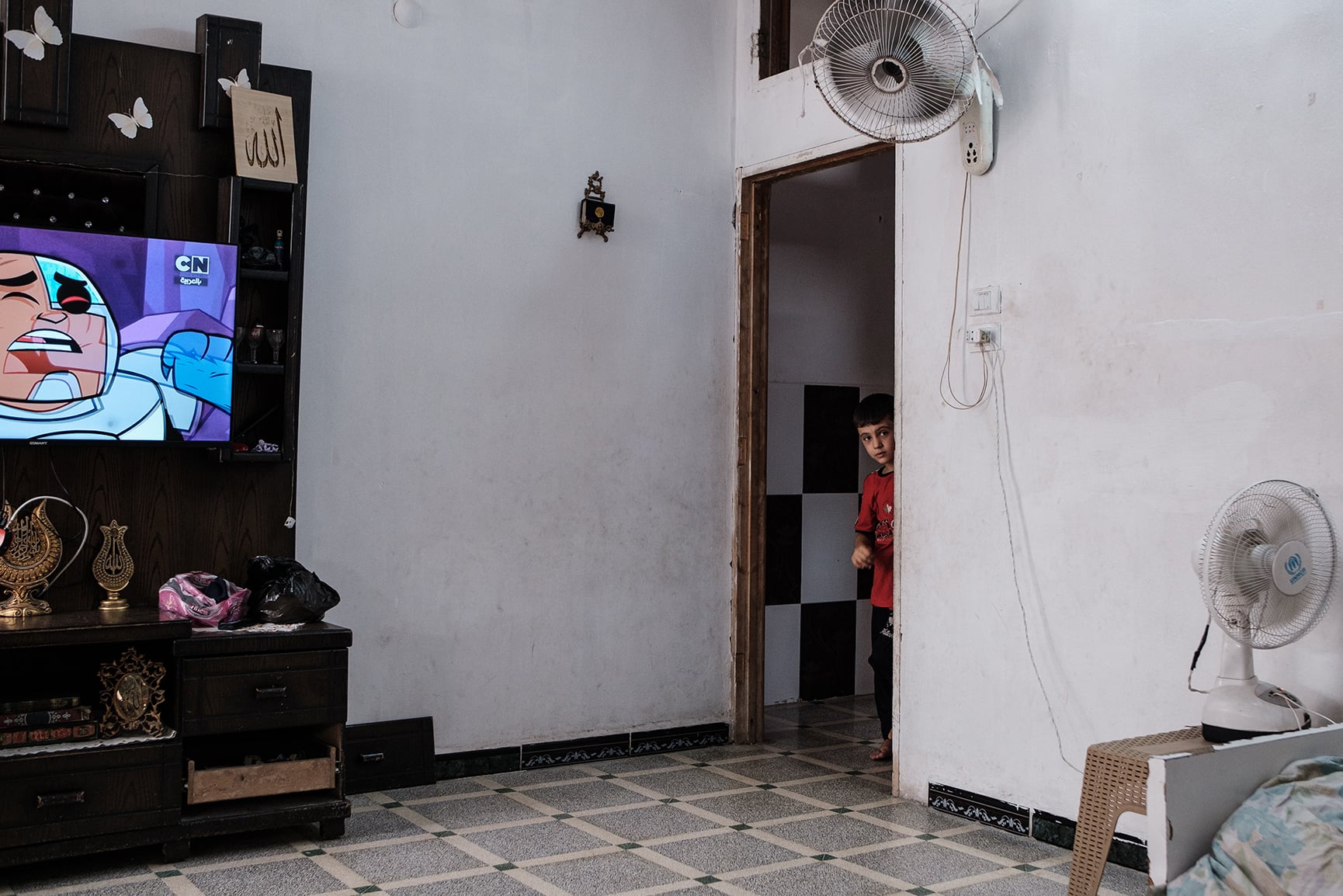 Ahmed, 6, is now living with his mother at a relative’s house in Aleppo, having lived most of his life in al-Hol camp, 27 July 2025.