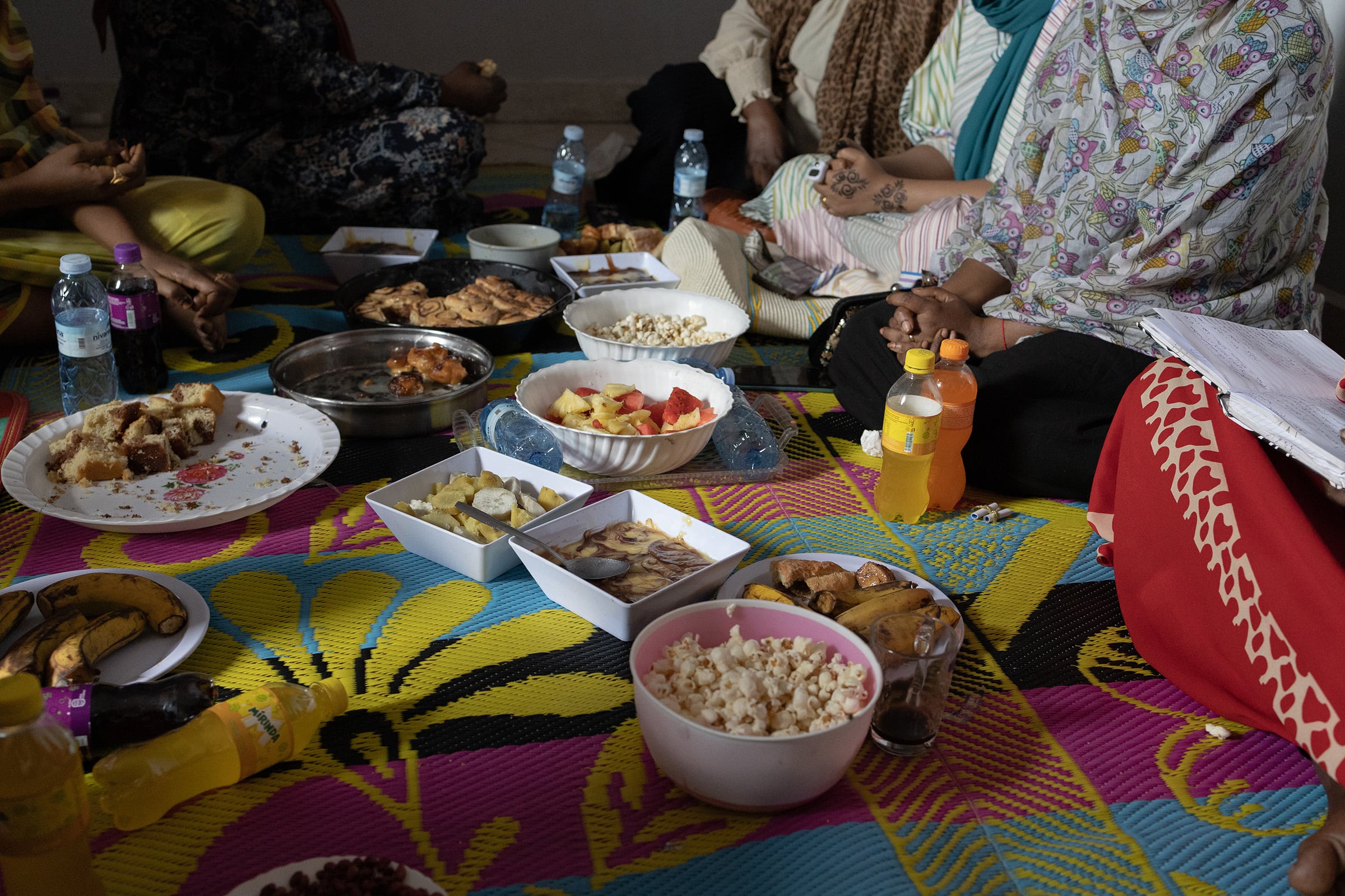 Snacks are served at a Funjan Niswan gathering hosted at the house of a participant.