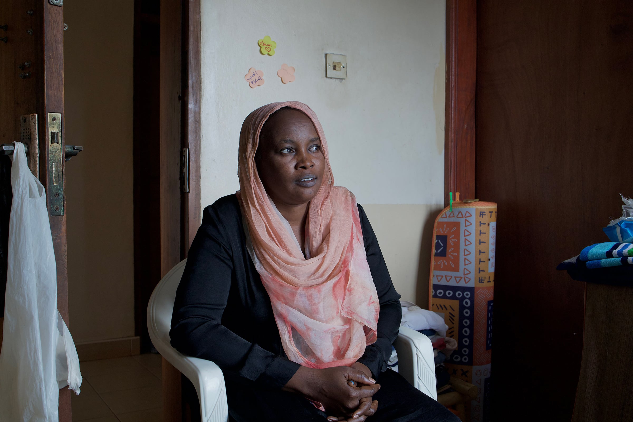 A portrait of Tayseer Salih inside her home in Kampala.