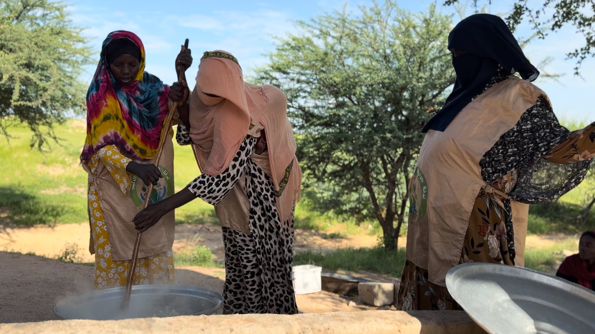 Women prepare food at a shelter run by an emergency response room in Tina, a border town in Darfur that has received large numbers of Sudanese escaping attacks by the paramilitary-turned-rebel Rapid Support Forces.