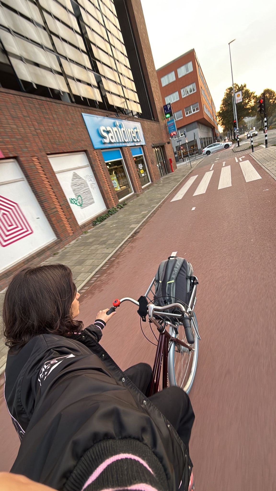 Rita Baroud takes a photo of herself as she bikes in the Netherlands.