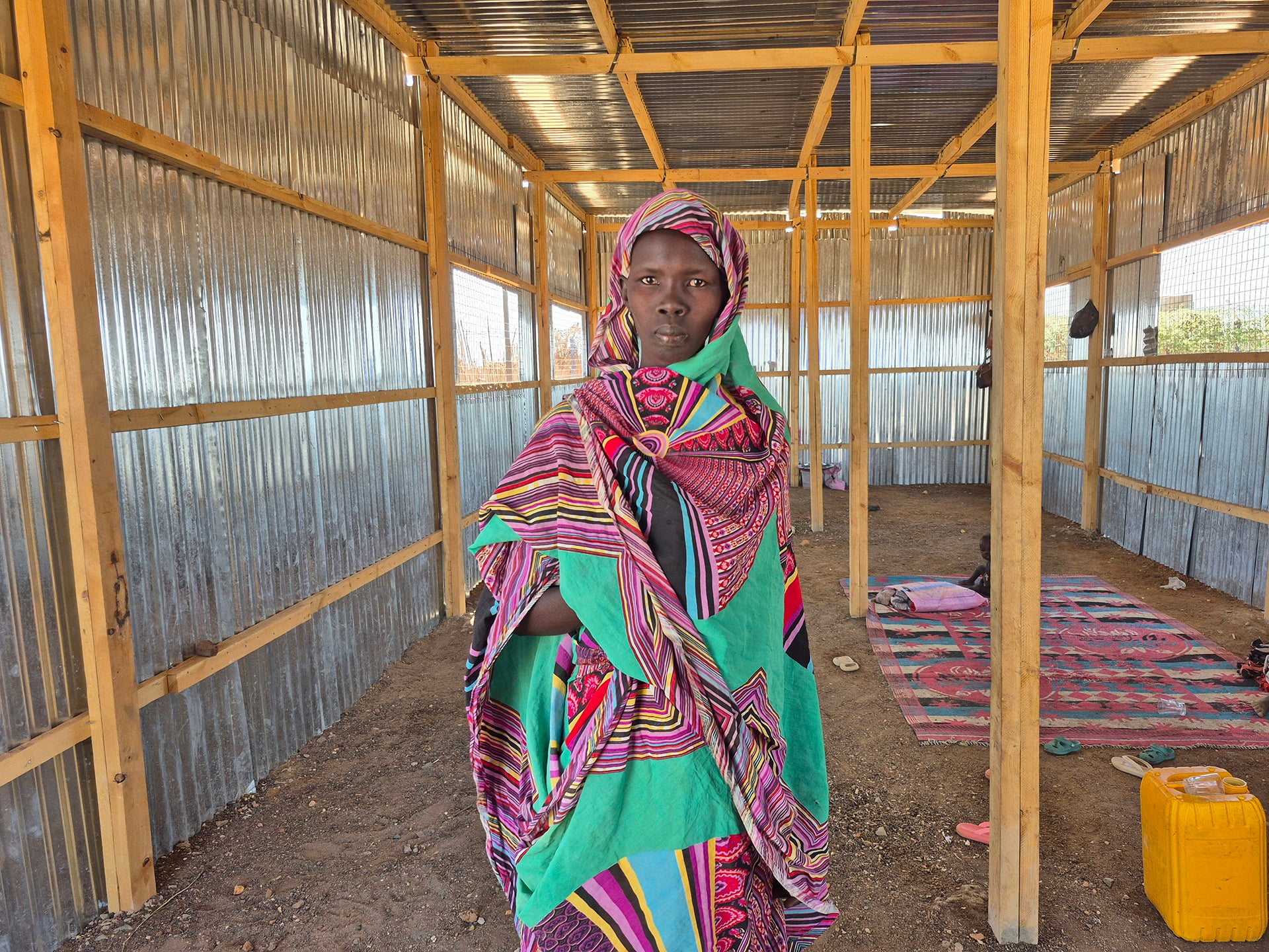Portrait of a woman inside a registration centre