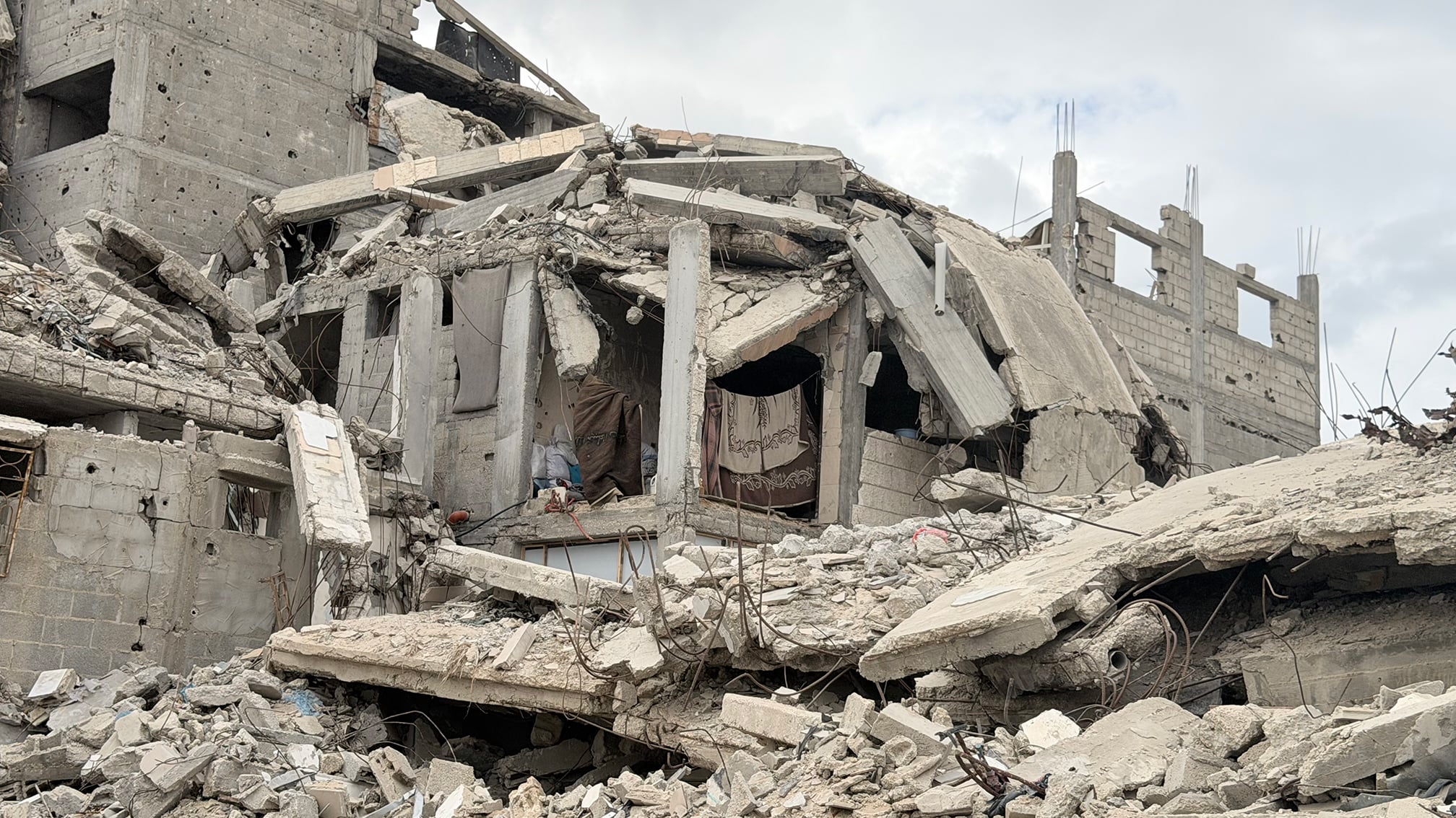 What remains of Mahasen's home, where she is currently living.