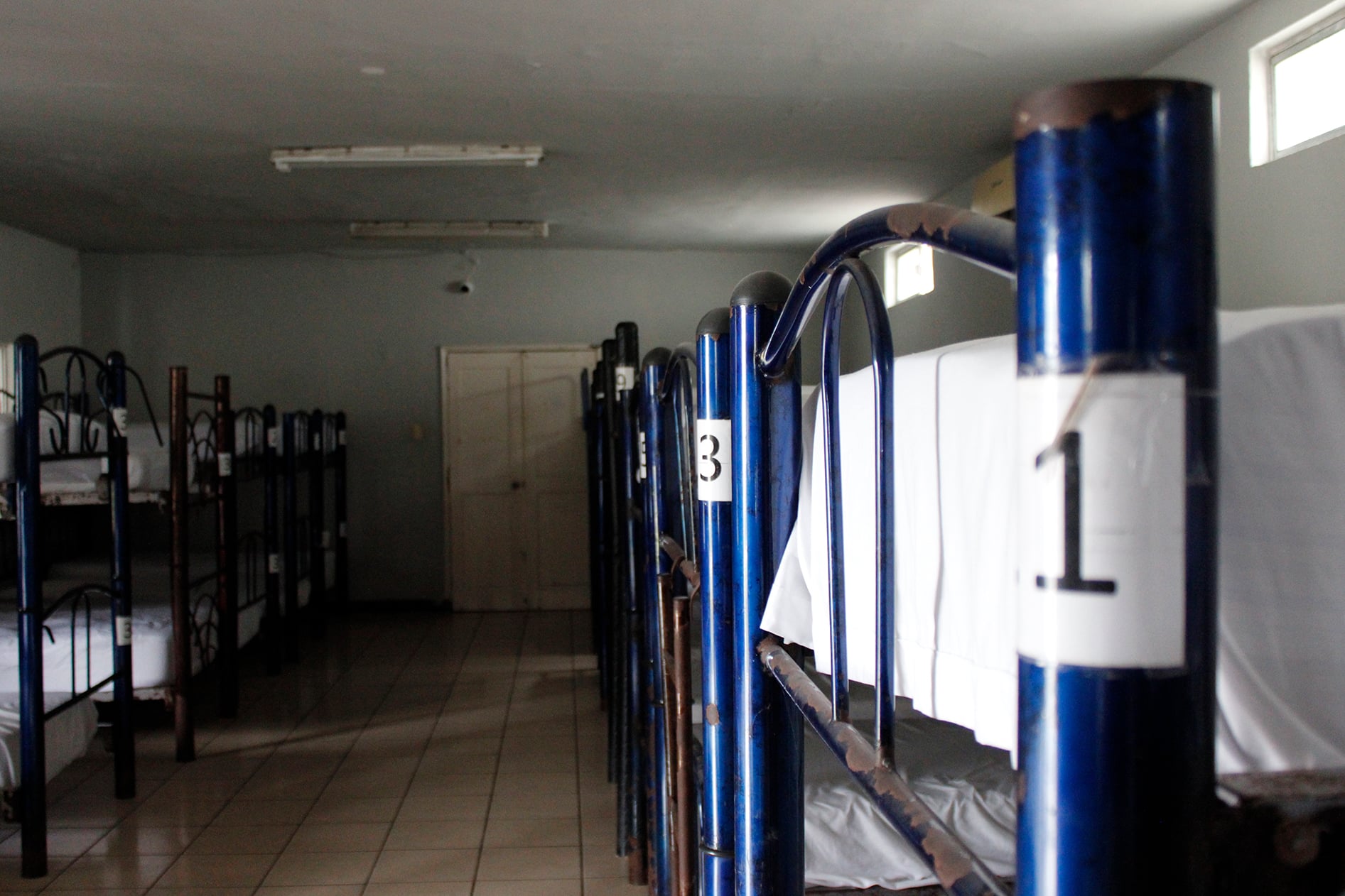 A picture of empty bunk beds at the dorms in Casa del Migrante.
