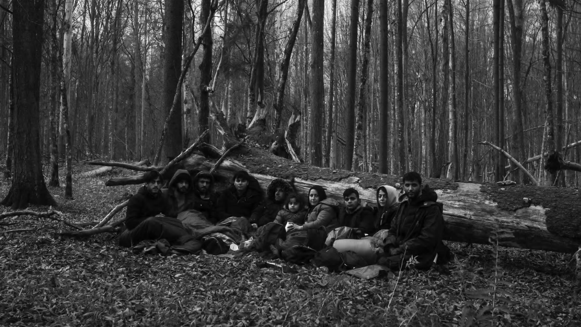 A refugee family from Kurdistan, hiding in the forest near Skupowo village, Poland, in 2021.