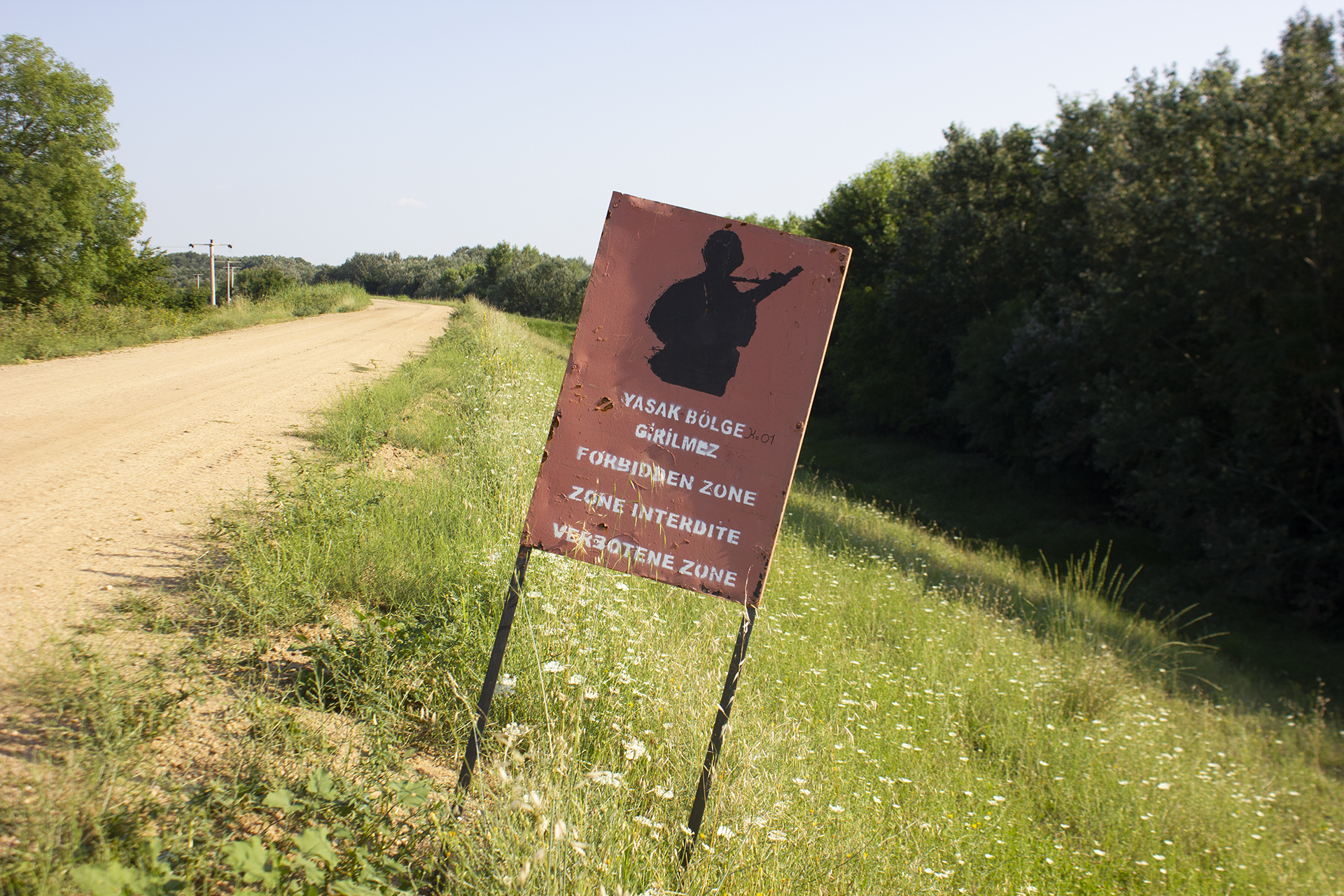 A sign announcing the beginning of a closed military zone on the Turkish side of the Greek-Turkish land border, July 2018.