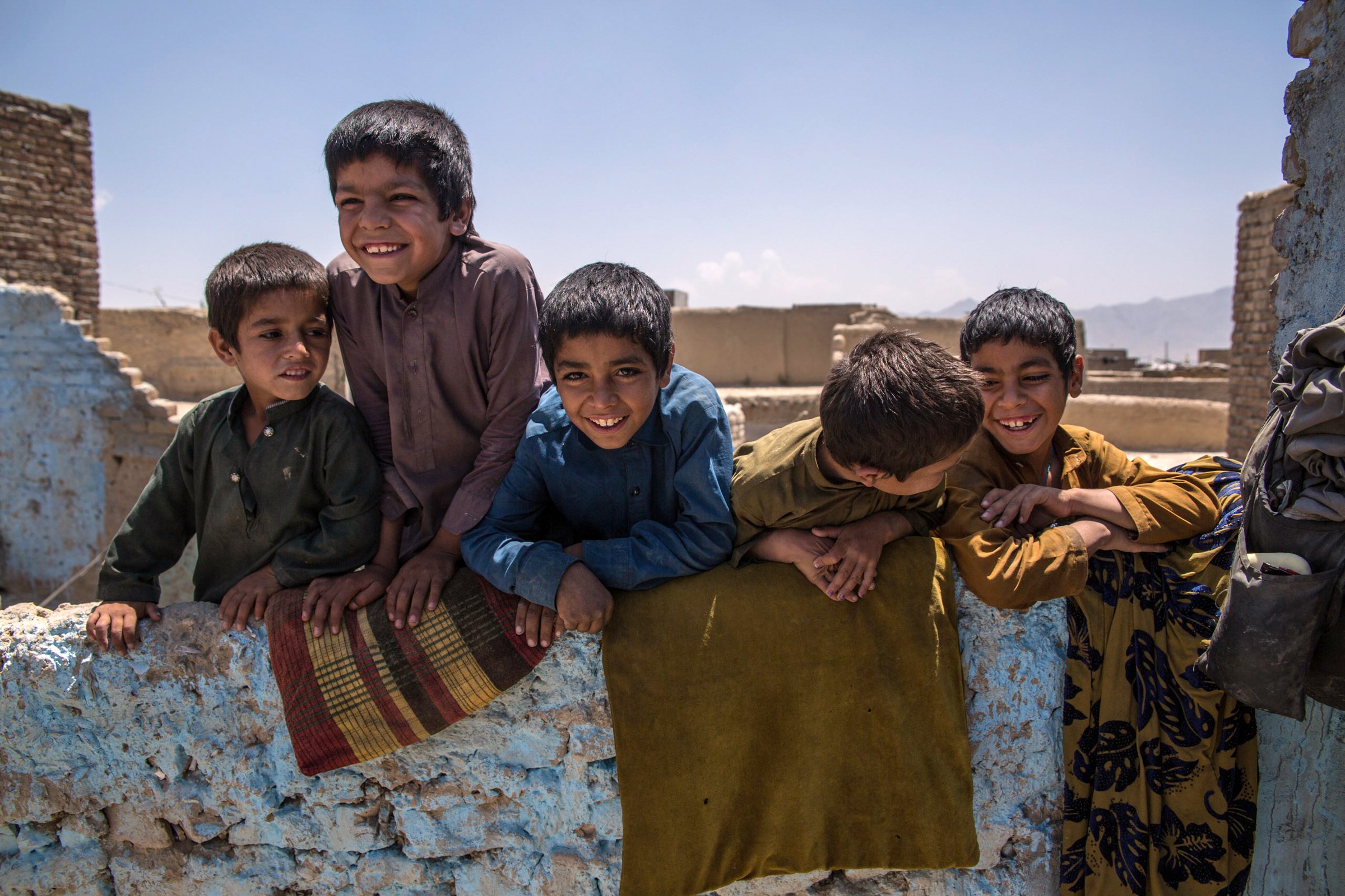 Photo of children in Afghanistan playing after returning from Pakistan.