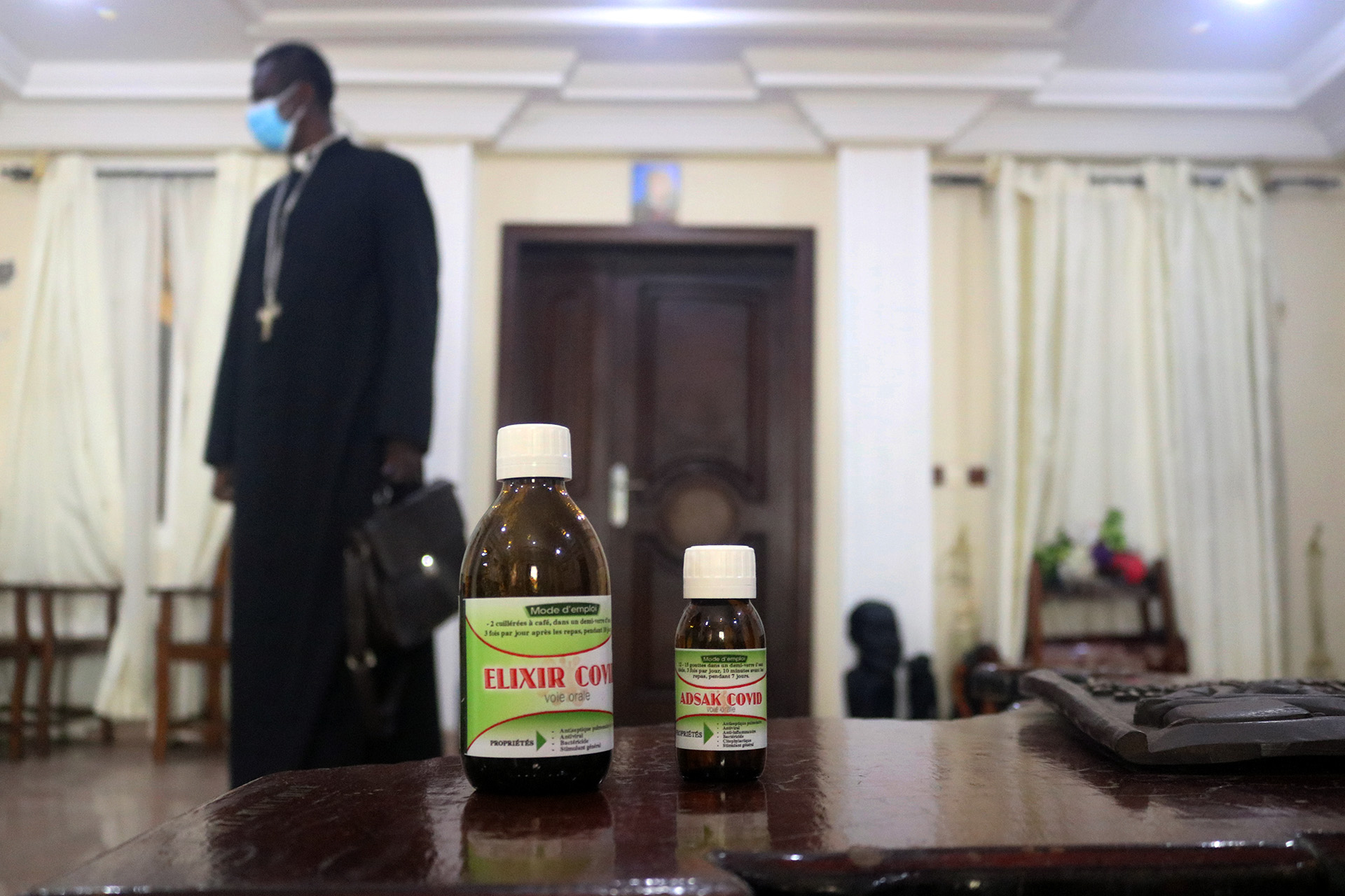 Samuel Kleda, Archbishop of Douala, claims to have helped treat COVID-19 patients with an "Elixir" concoction he made himself and distributes for free.