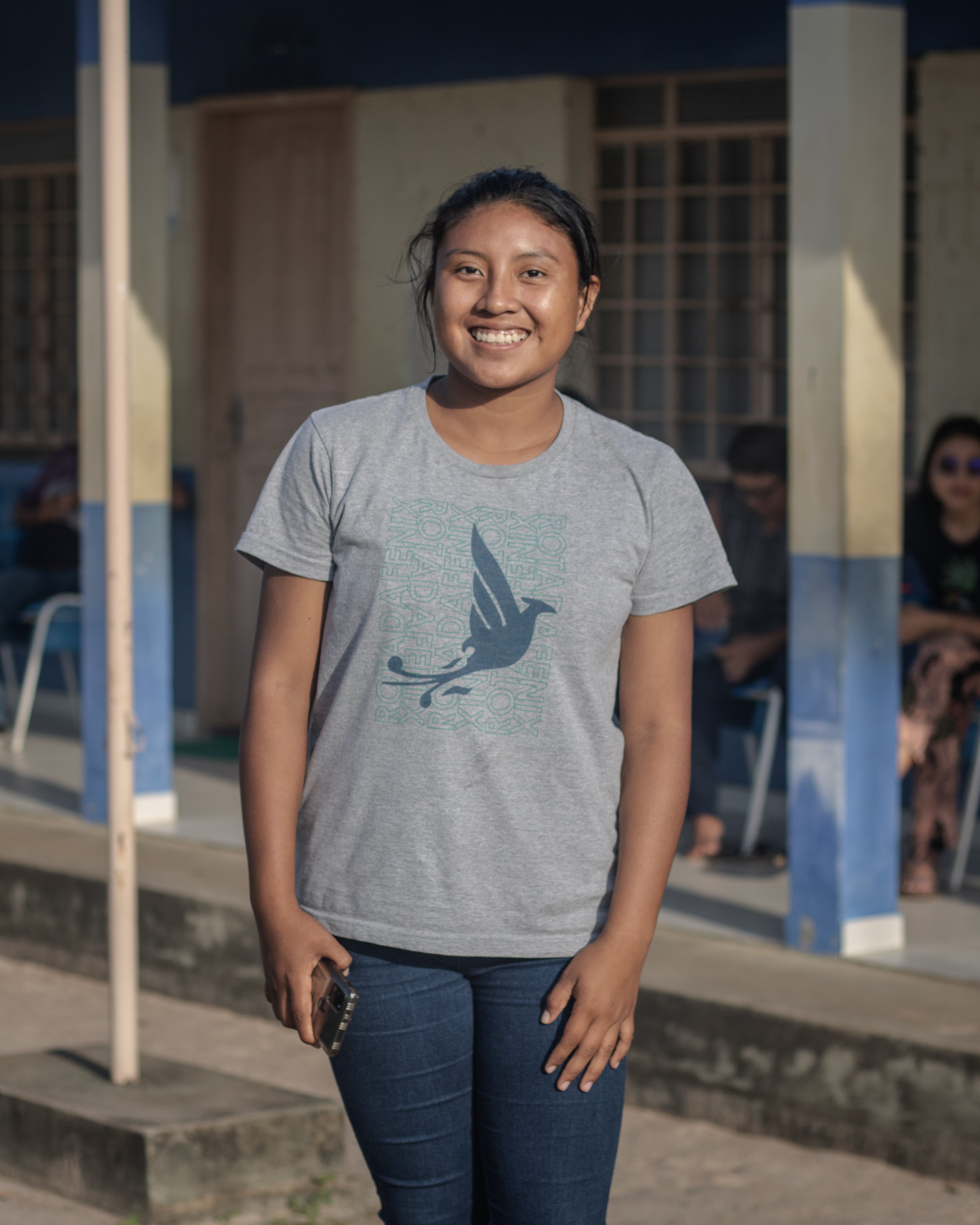 Seventeen-year-old Gleyniane Trajano in front of the polling station, after voting for the first time.