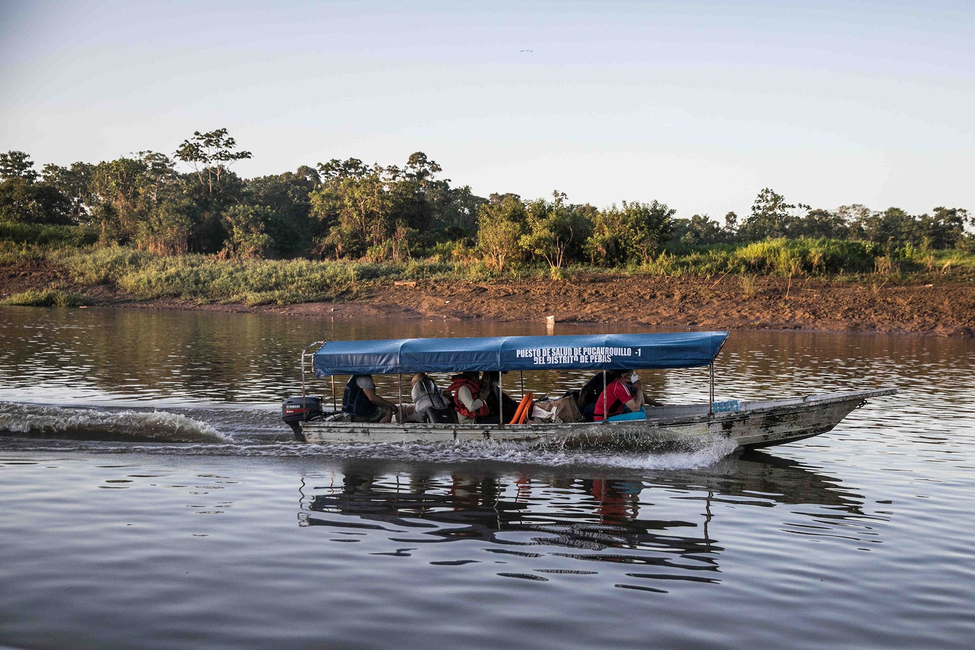 A boat sails on a river