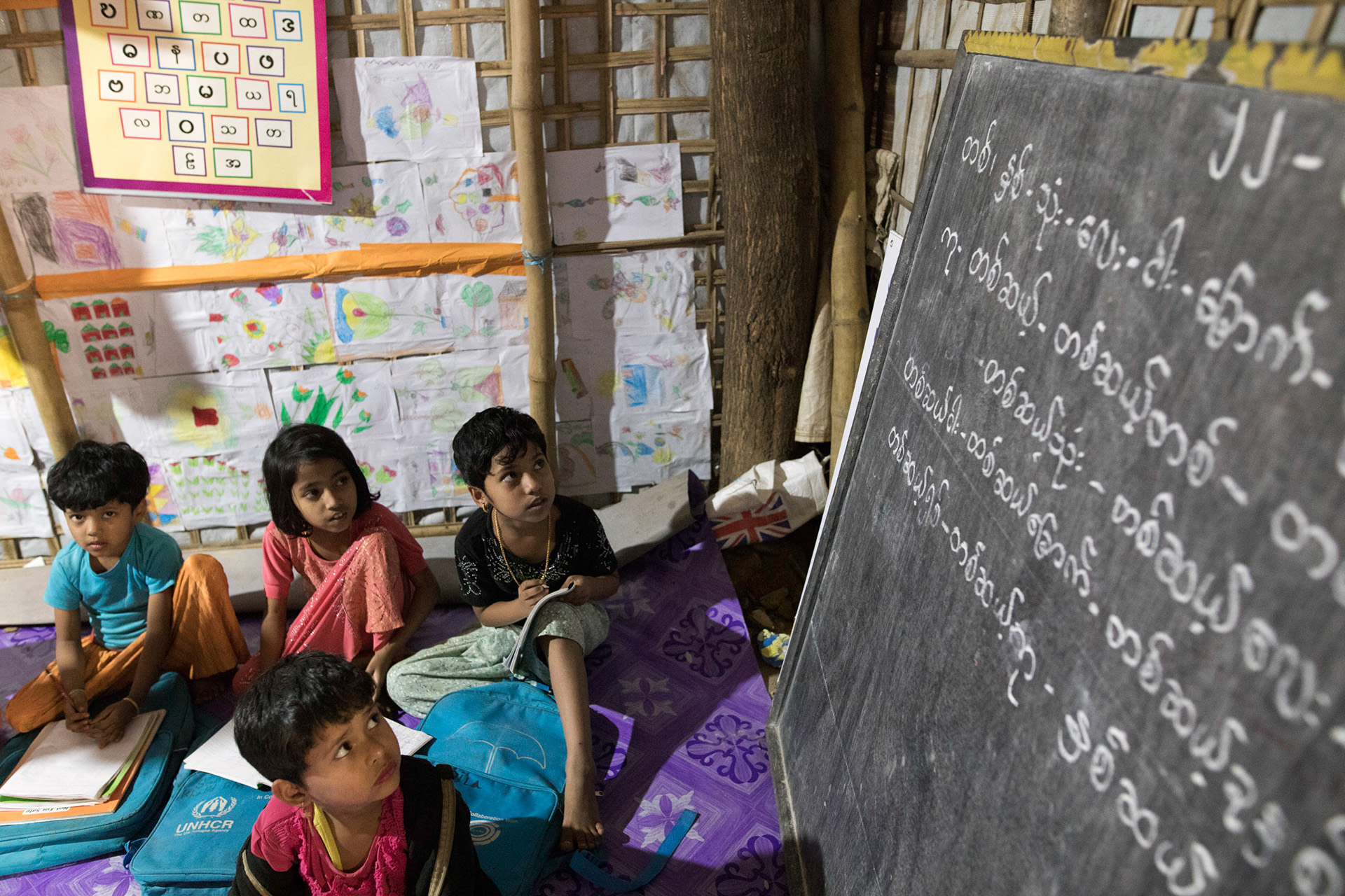 Rohingya students attend an NGO-run classroom in February 2020