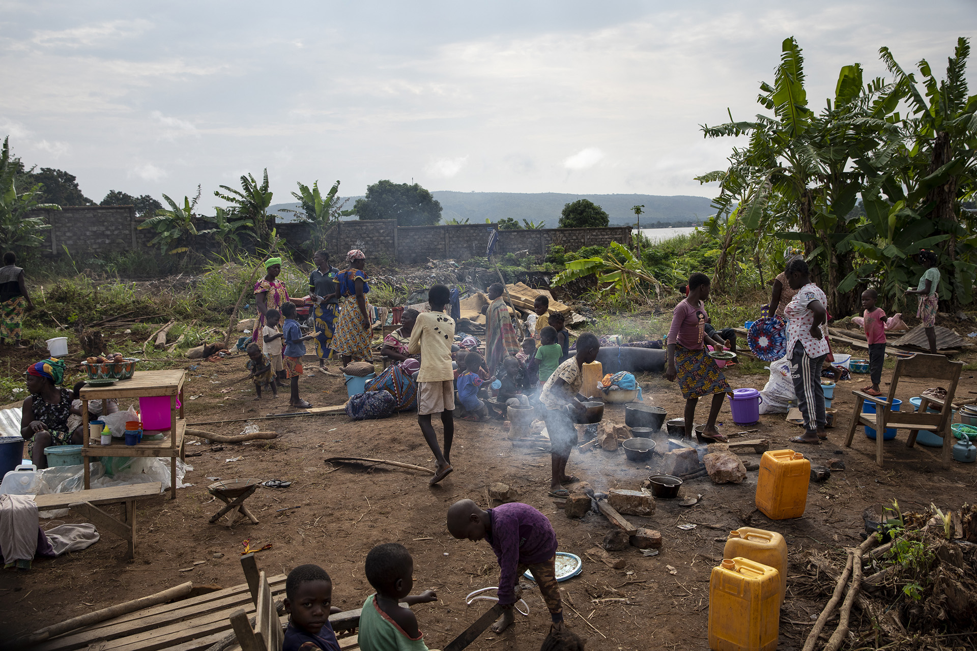 At the Socada site, 2036 people are waiting for a roof to be installed on the abandoned building. They live all together under one main tent and smaller shelters provided by humanitarians.