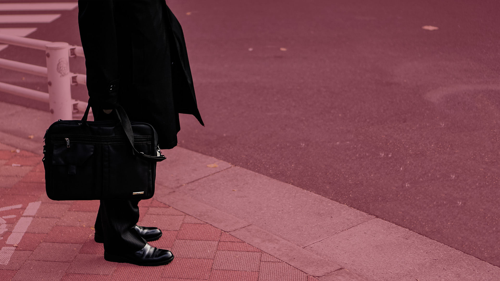 Person holding briefcase