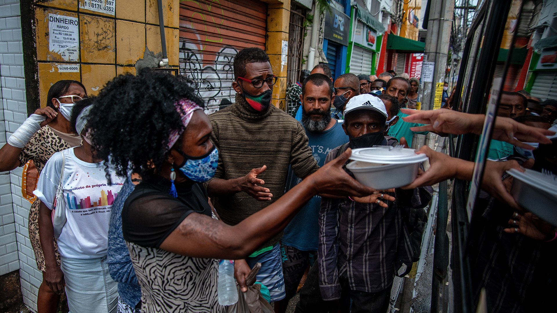 Homeless people awaiting food donations in the historic centre of Salvador, in Brazil’s northeast, a region long affected by drought and social inequality.