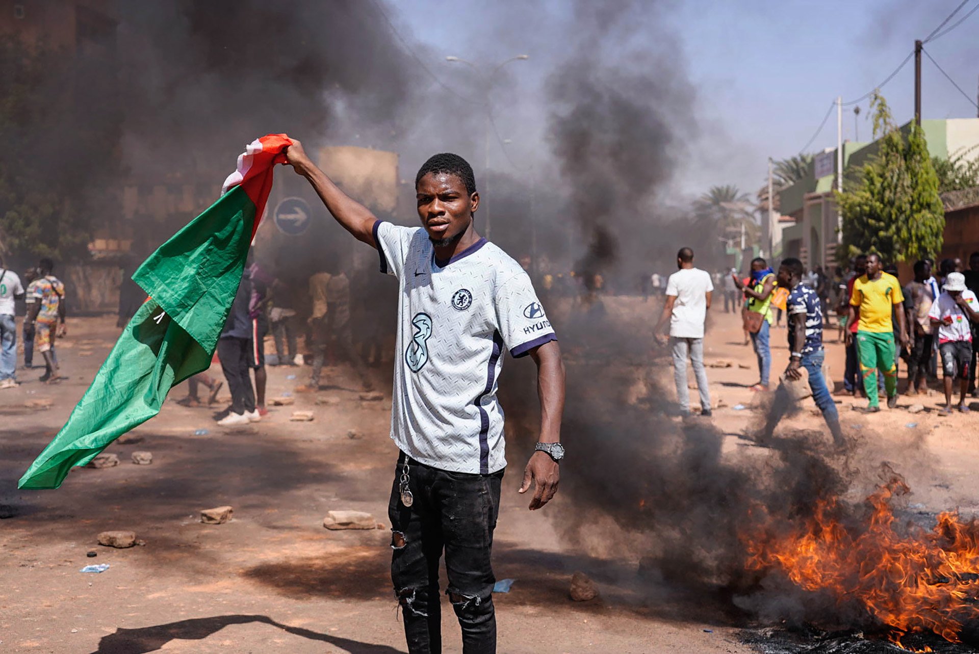 Tyres burn at a protest last month following the killing of more than 50 gendarmes by jihadists in northern Burkina Faso.