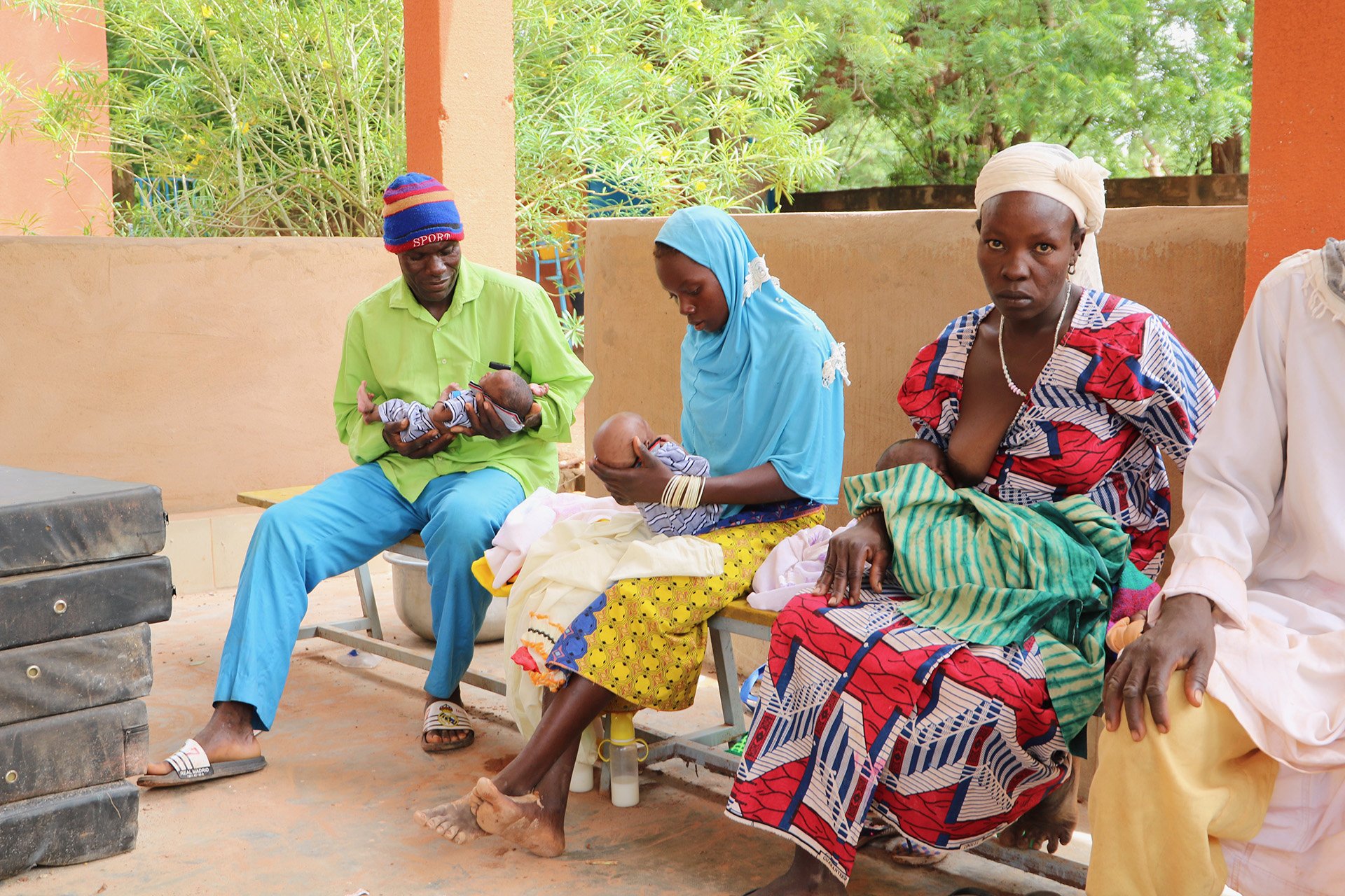 Parents of malnourished children at a local hospital in Kongoussi