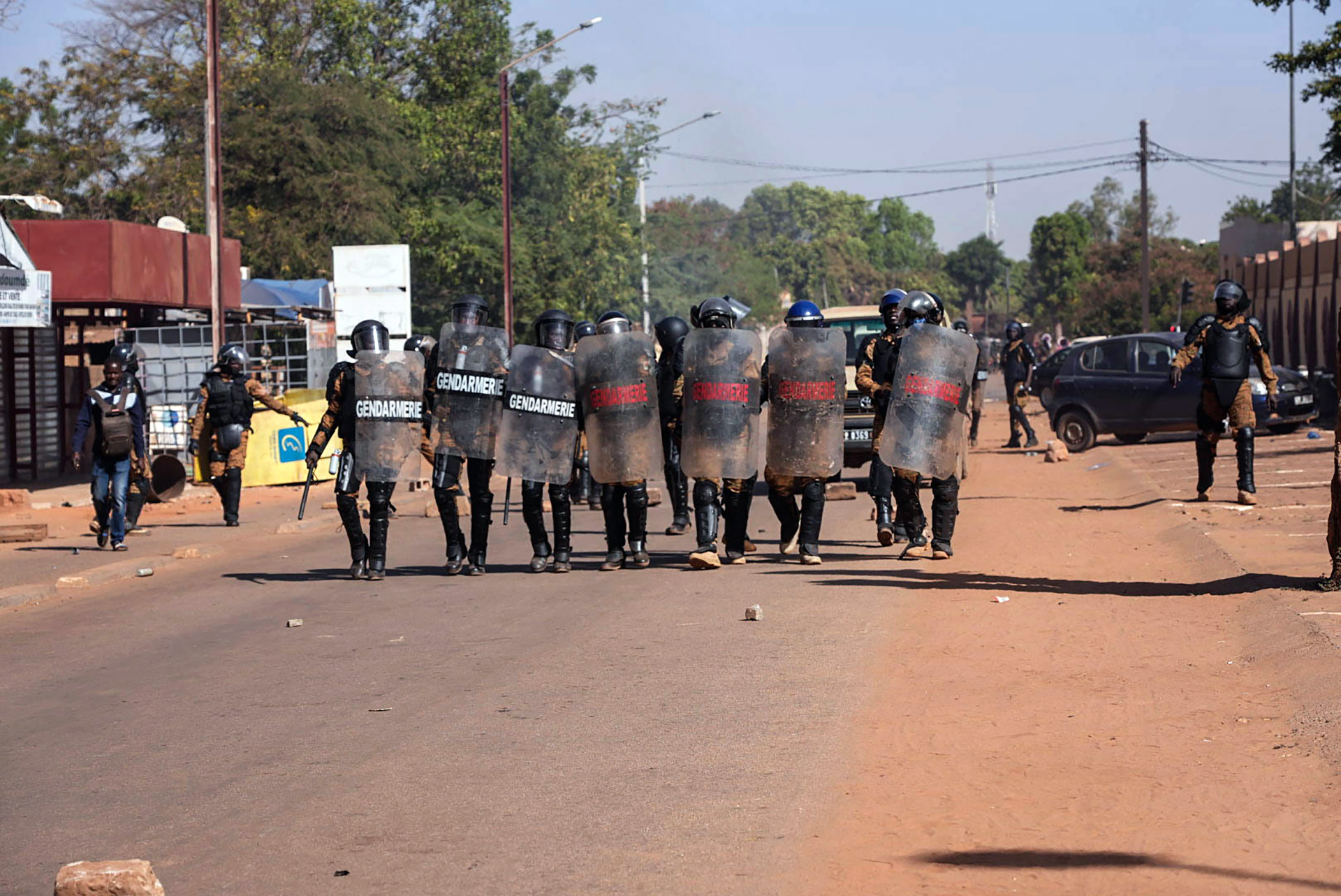 A group of gendarmes on the streets in Ouagadougou during recent protests against the government. Public frustration is growing as the security situation deteriorates.