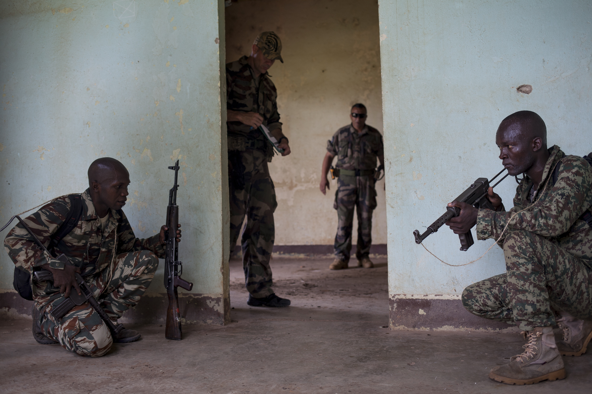 Central African government soldiers receive training by European Union advisors before deploying across the country.