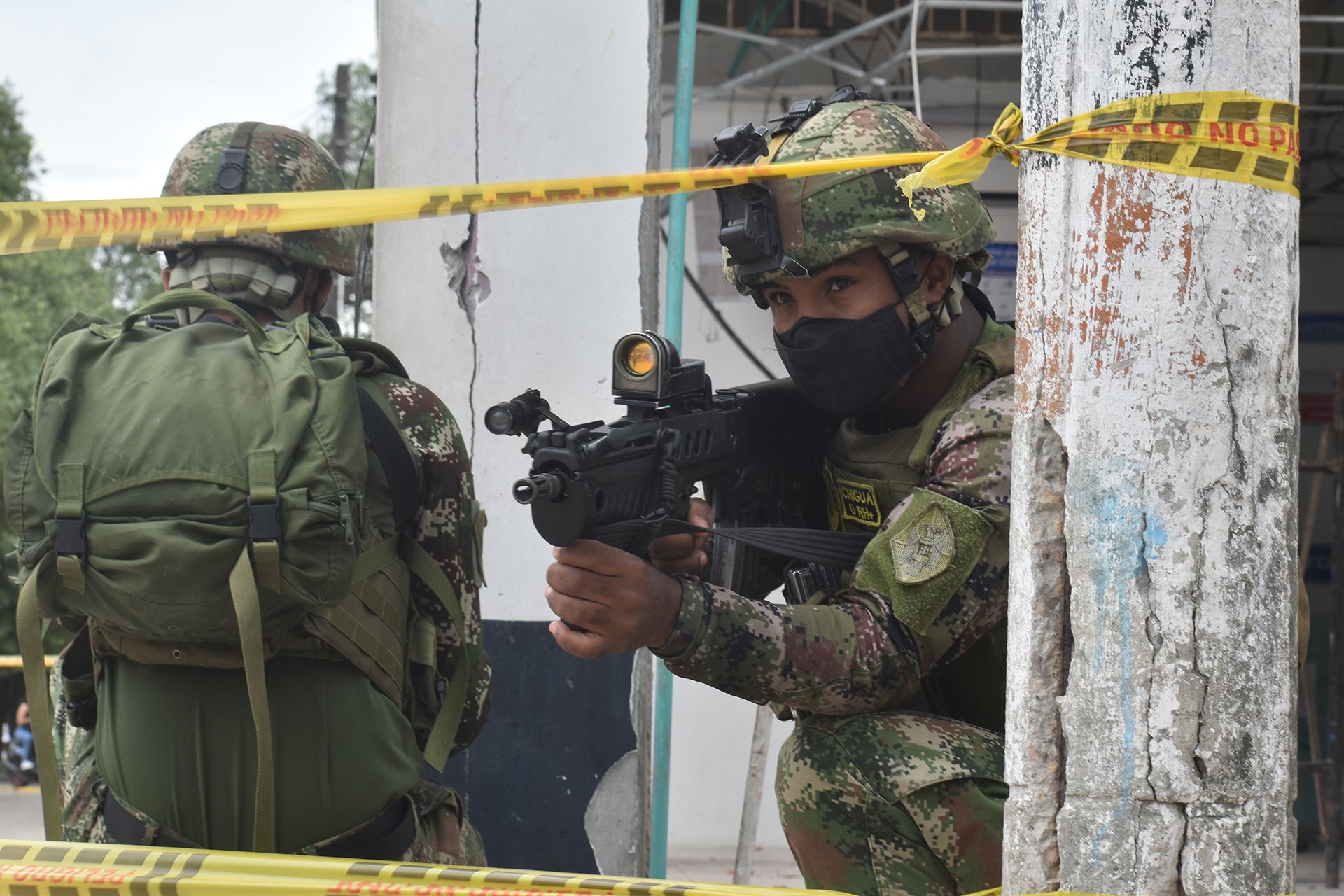 Colombian soldiers deploy near a the site of a car bombing in Saravena, Arauca on 20 January. Violence and conflict have been steadily growing in the region since 2018.