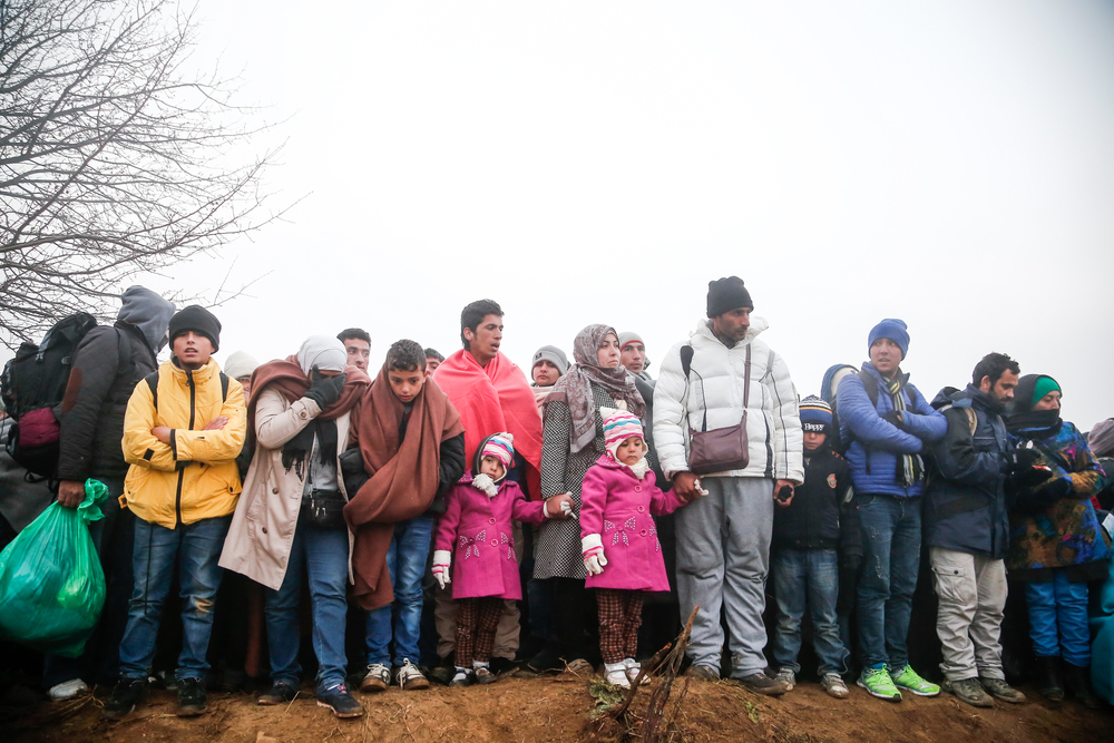 Asylum seekers attempting to cross into Macedonia