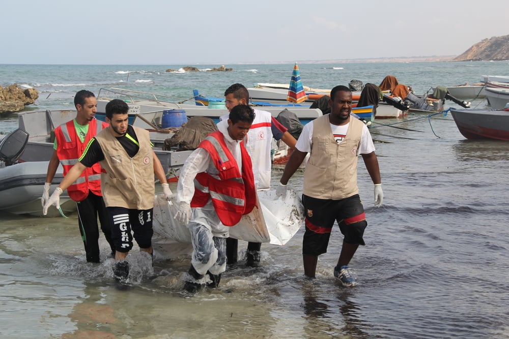 The LRCS team retrieve a body from the water 