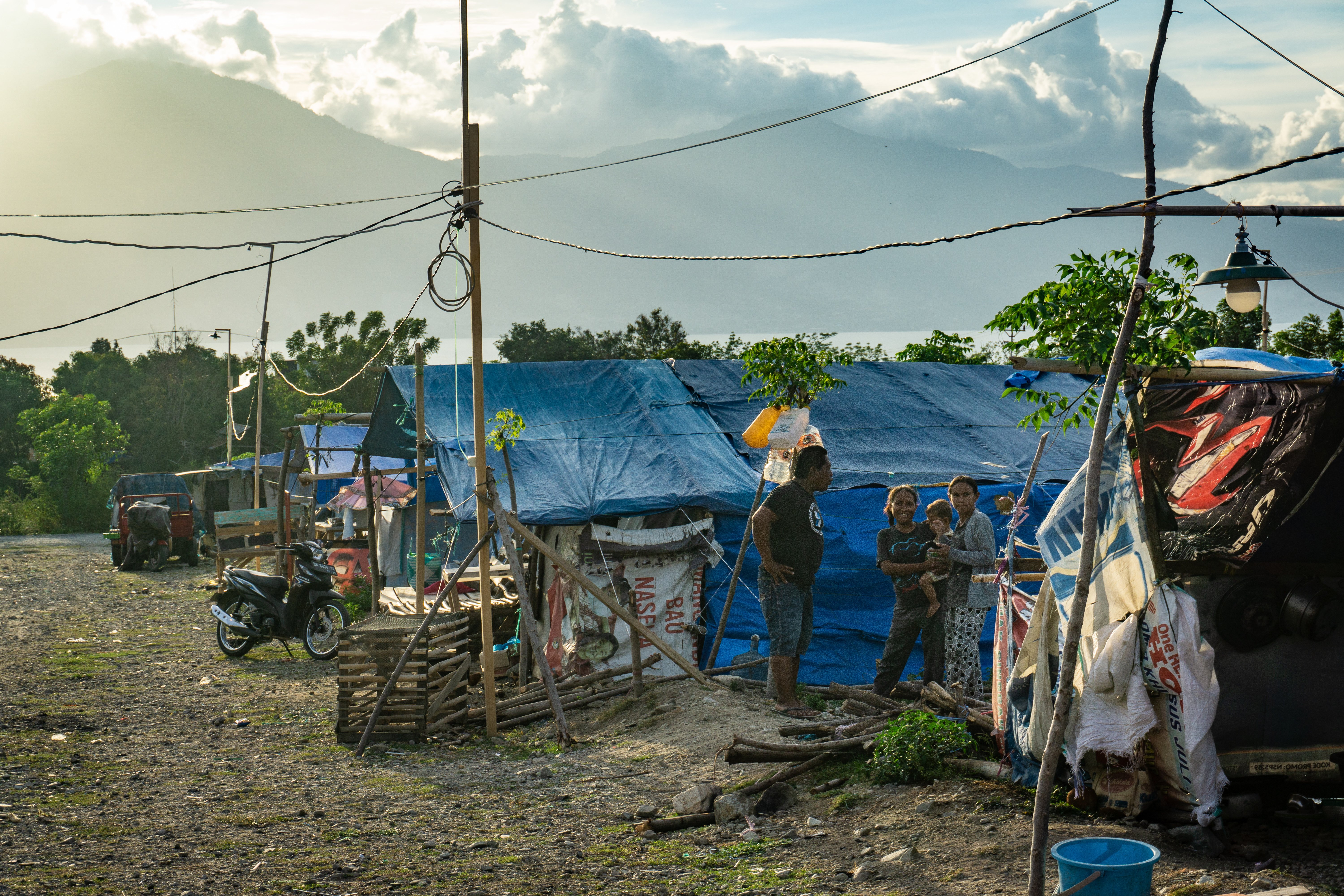 A family in a tent camp on the outskirts of Palu.