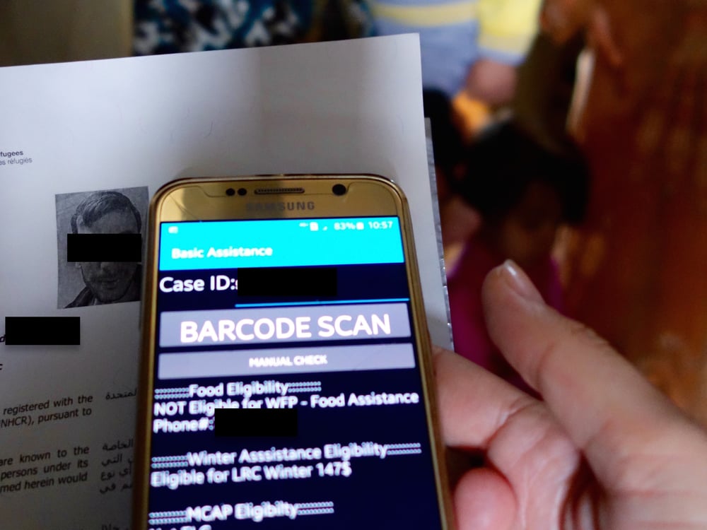 A UNHCR app allows field workers in Lebanon to check refugee entitlements via barcode