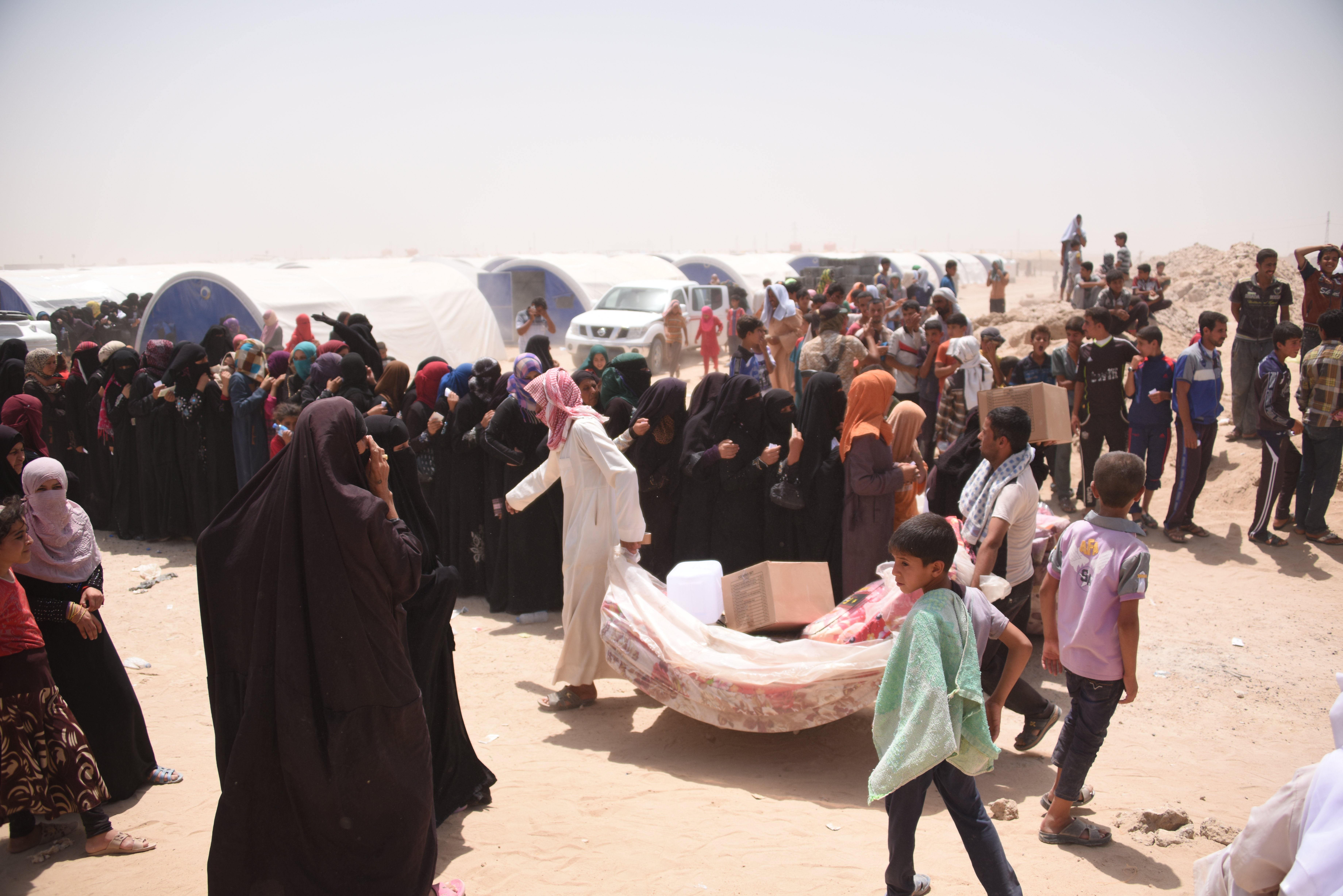 People line up for aid