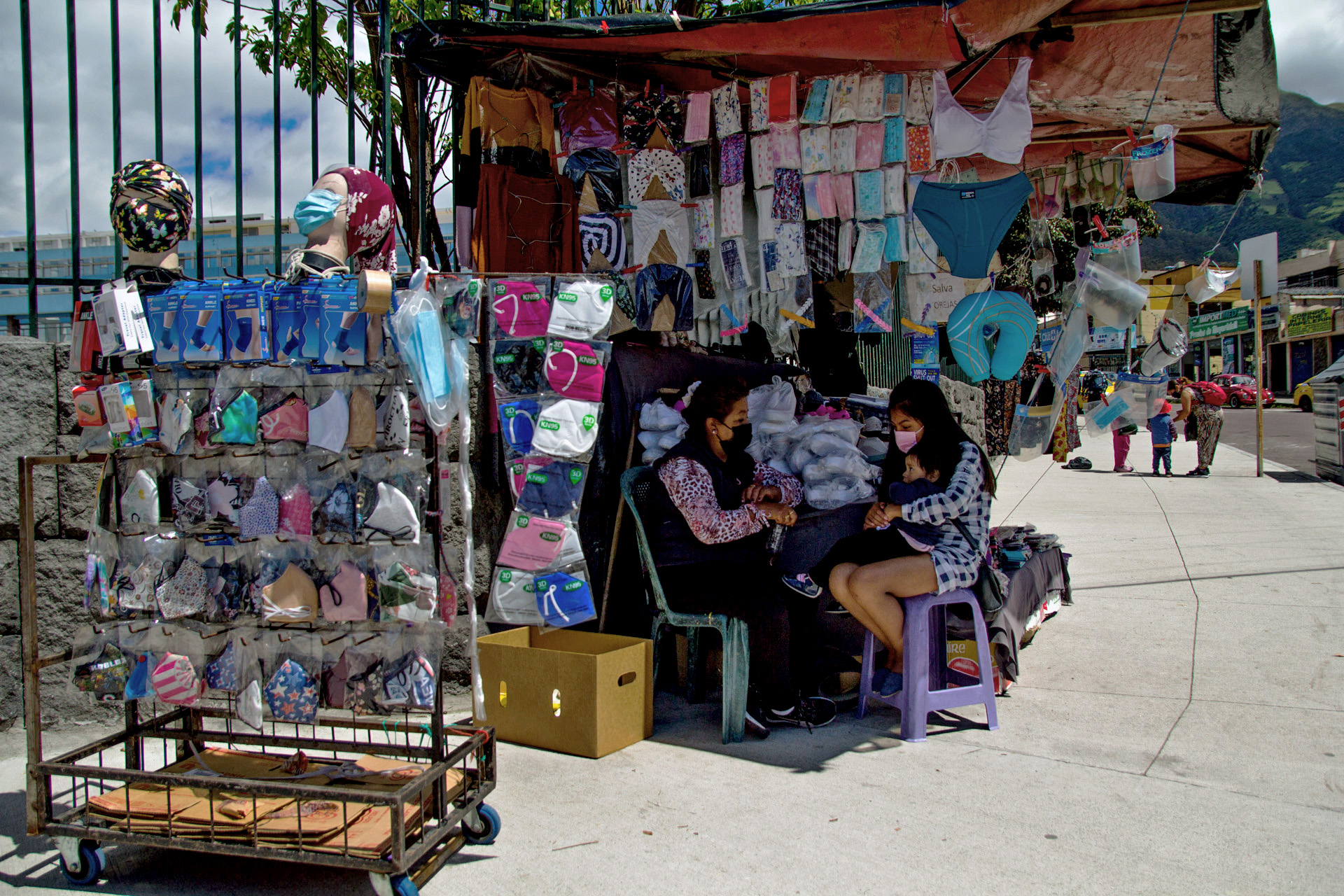 A street vendor in front of the Carlos Andrade Marín IESS hospital in Quito, Ecuador sells masks and other basic pharmacy supplies.