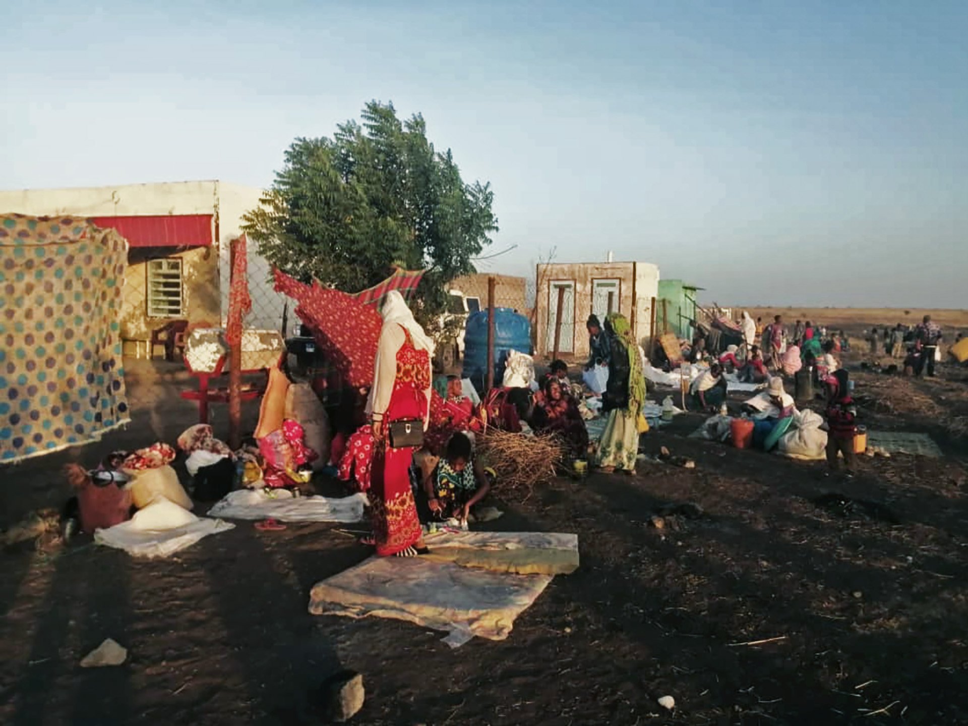 A photo of Tigrayan refugees congregating in the border town of Hamdayet, which has a small transit centre managed by the UN’s refugee agency