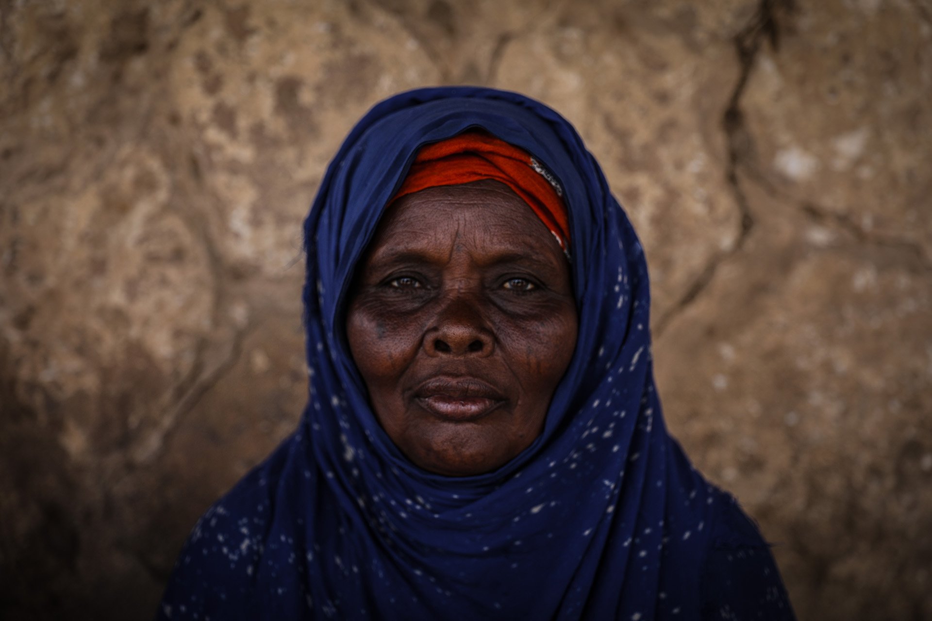 Miriam Ladieye sells charcoal to support her family. She is yet to receive any help from the government’s social protection programme.