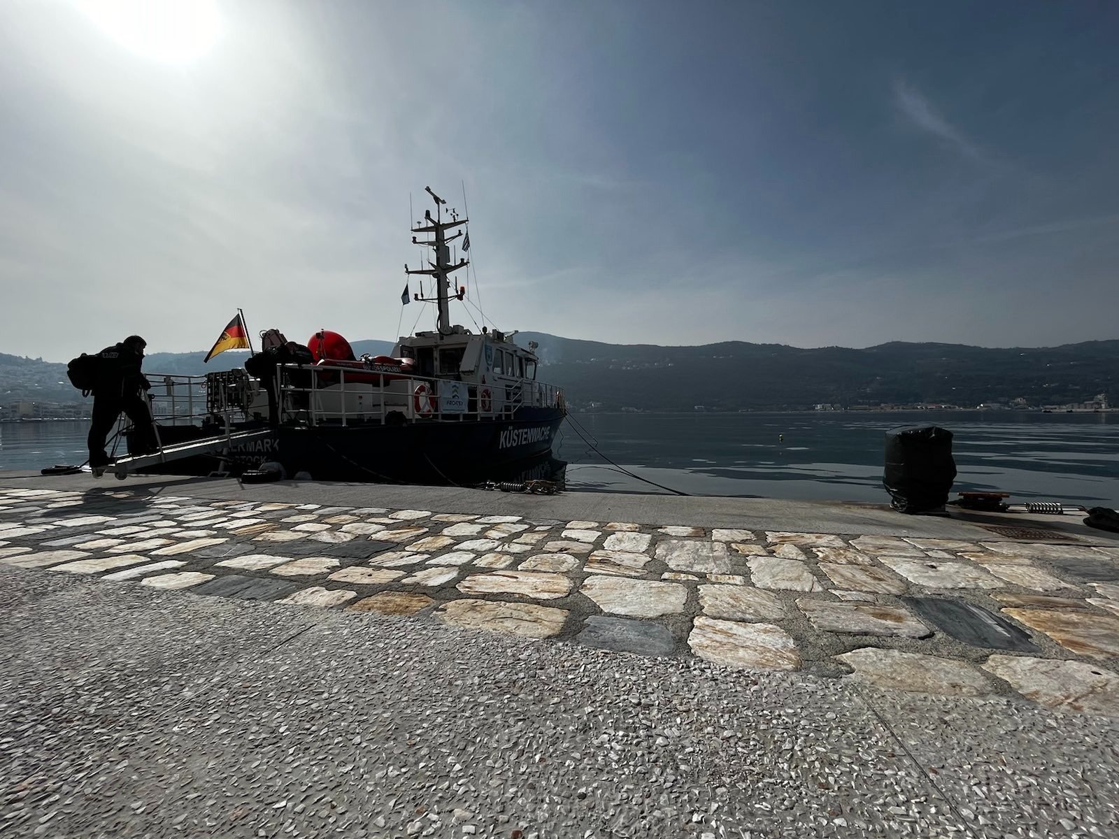 A Frontex vessel with the German flag at the port of Vathy on the eastern Aegean island of Samos, Greece.