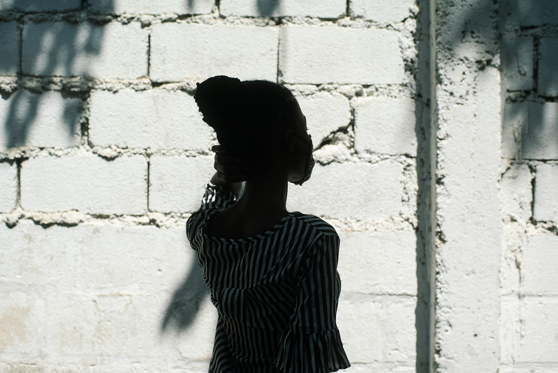 A Haitian woman's silhouette