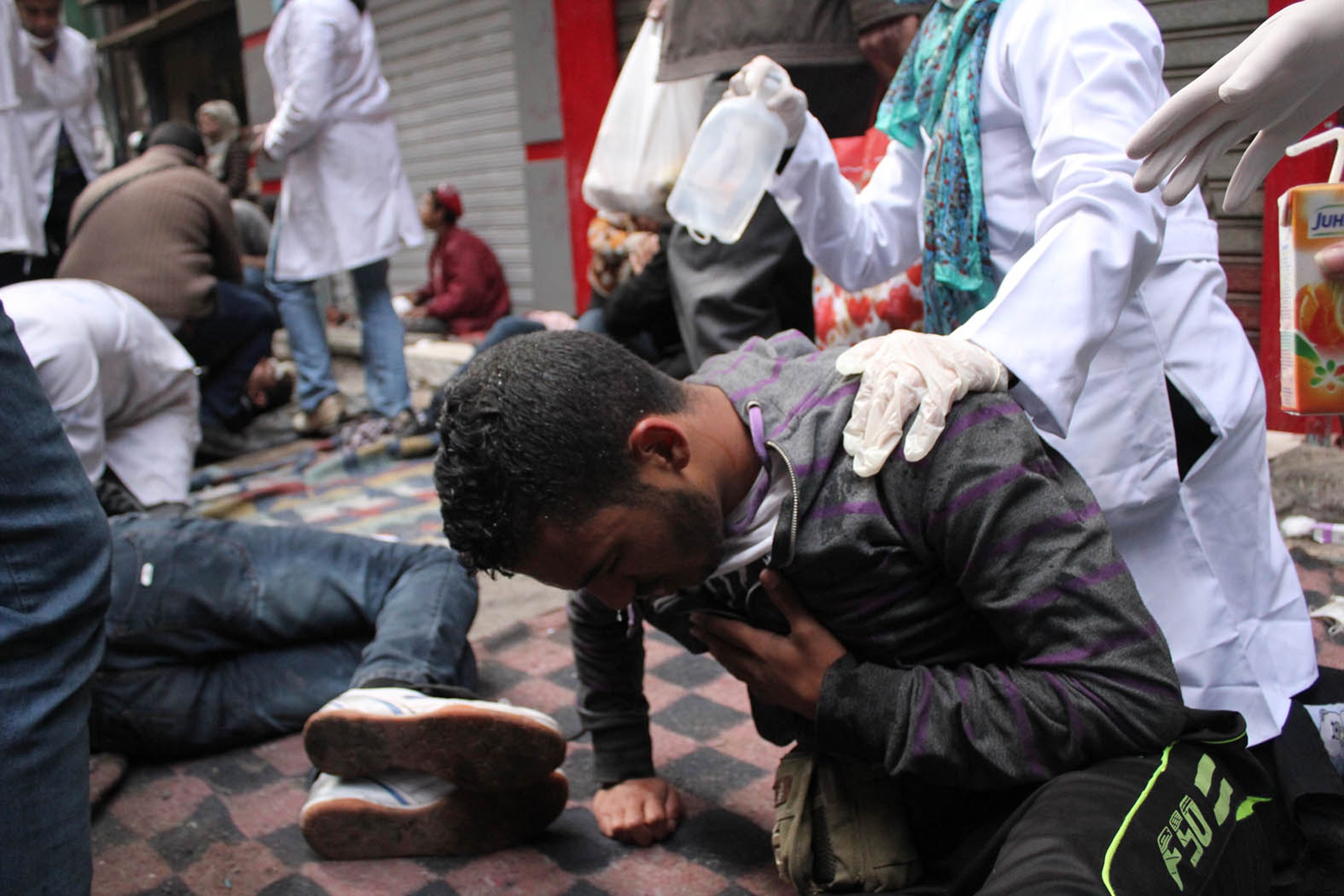 Doctors and medical students providing first aid for protesters in Cairo